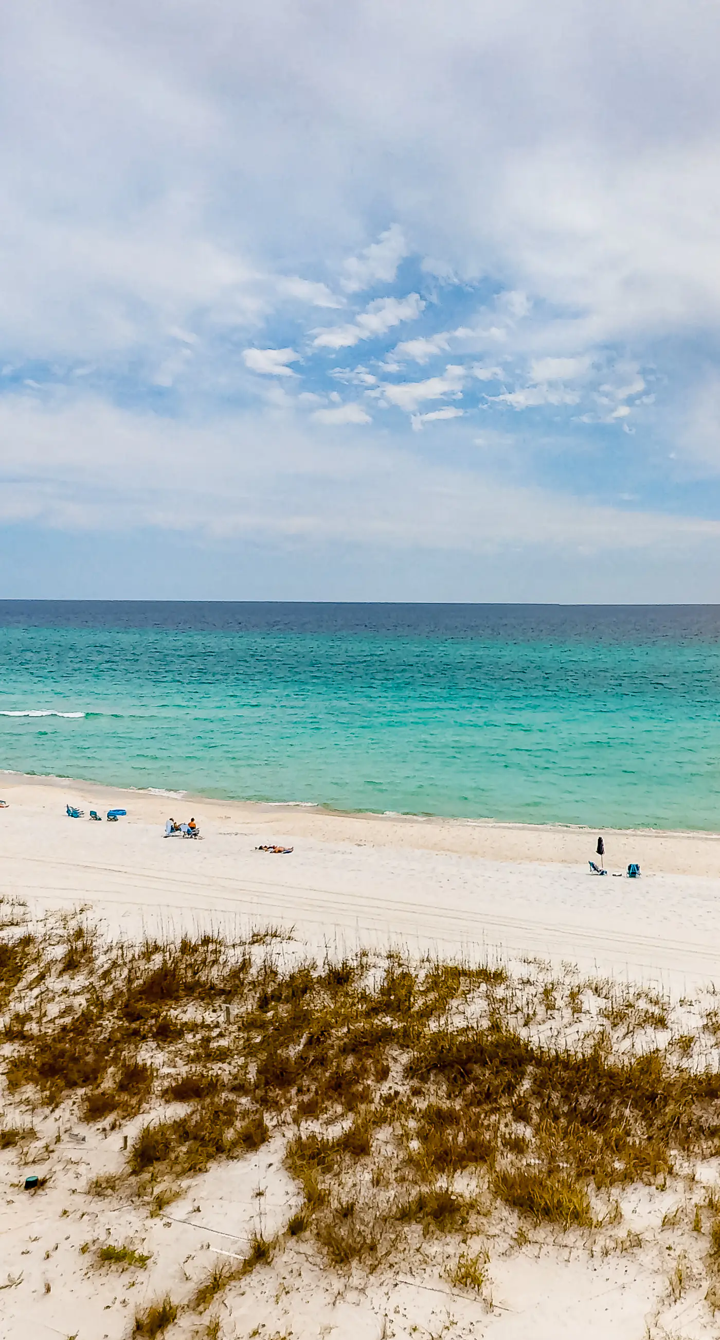 Secluded beach escape with panoramic Gulf view, tennis courts, balcony & W/D