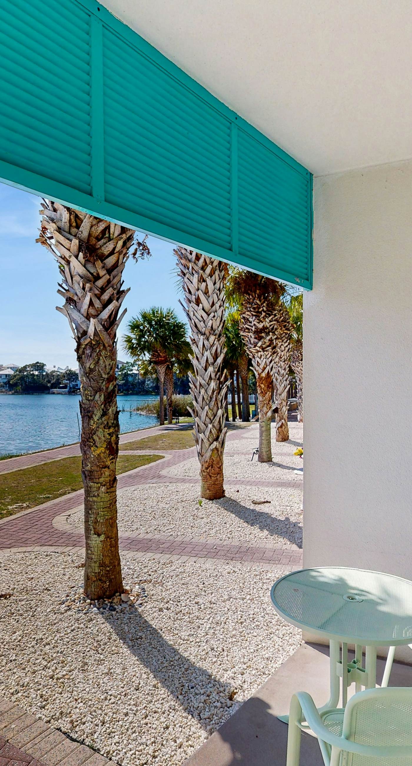 Lakefront dog-friendly condo with water views, pool, hot tub & beach access