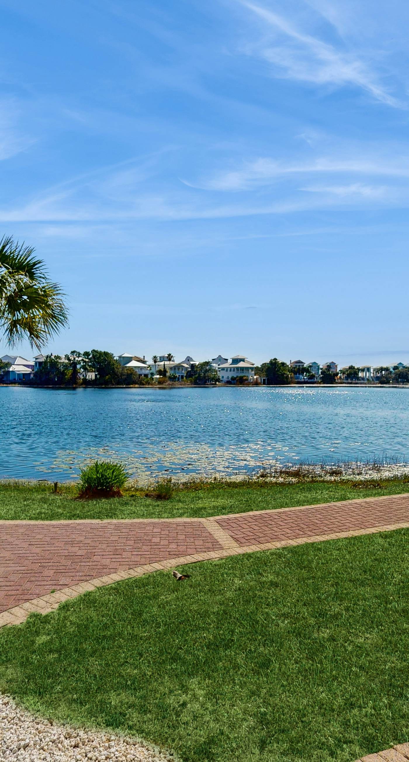 Lakefront dog-friendly condo with water views, pool, hot tub & beach access