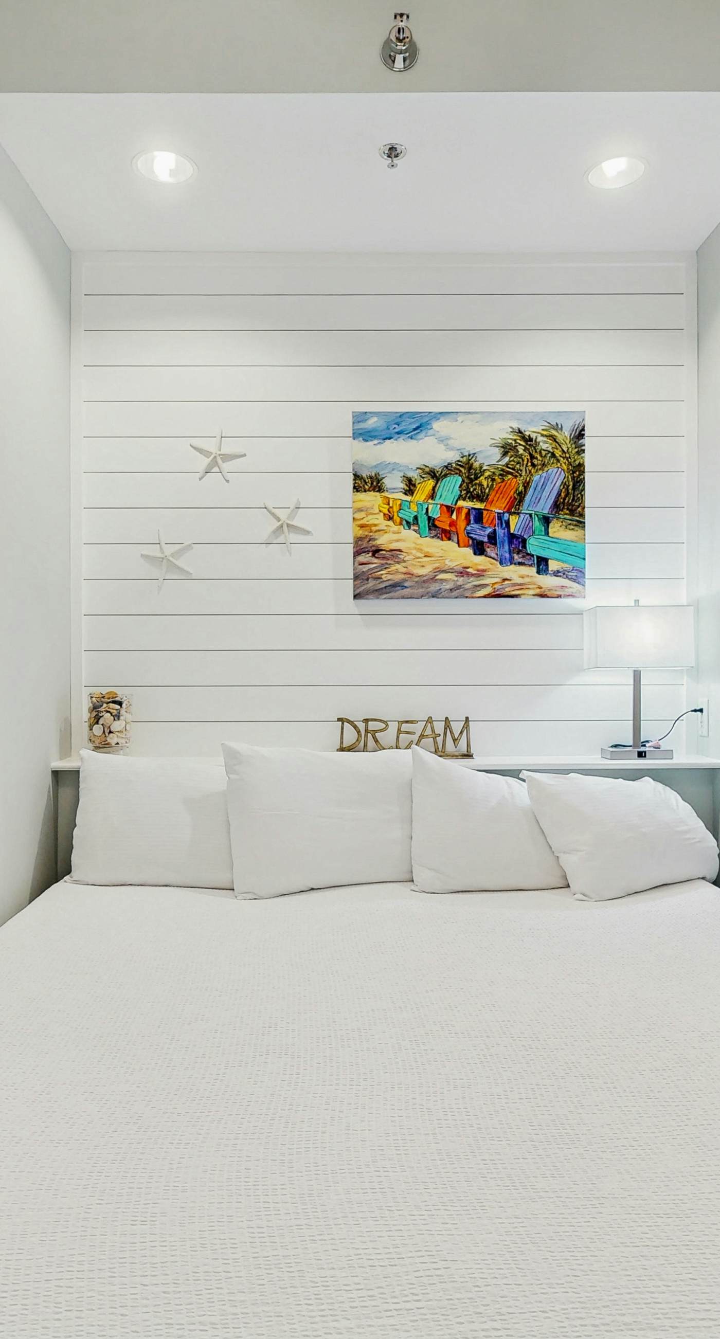 Lakefront dog-friendly condo with water views, pool, hot tub & beach access