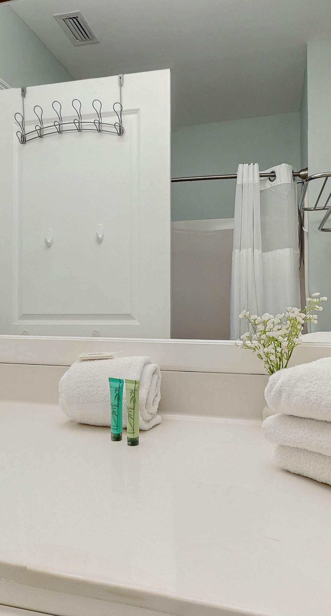 Lakefront dog-friendly condo with water views, pool, hot tub & beach access