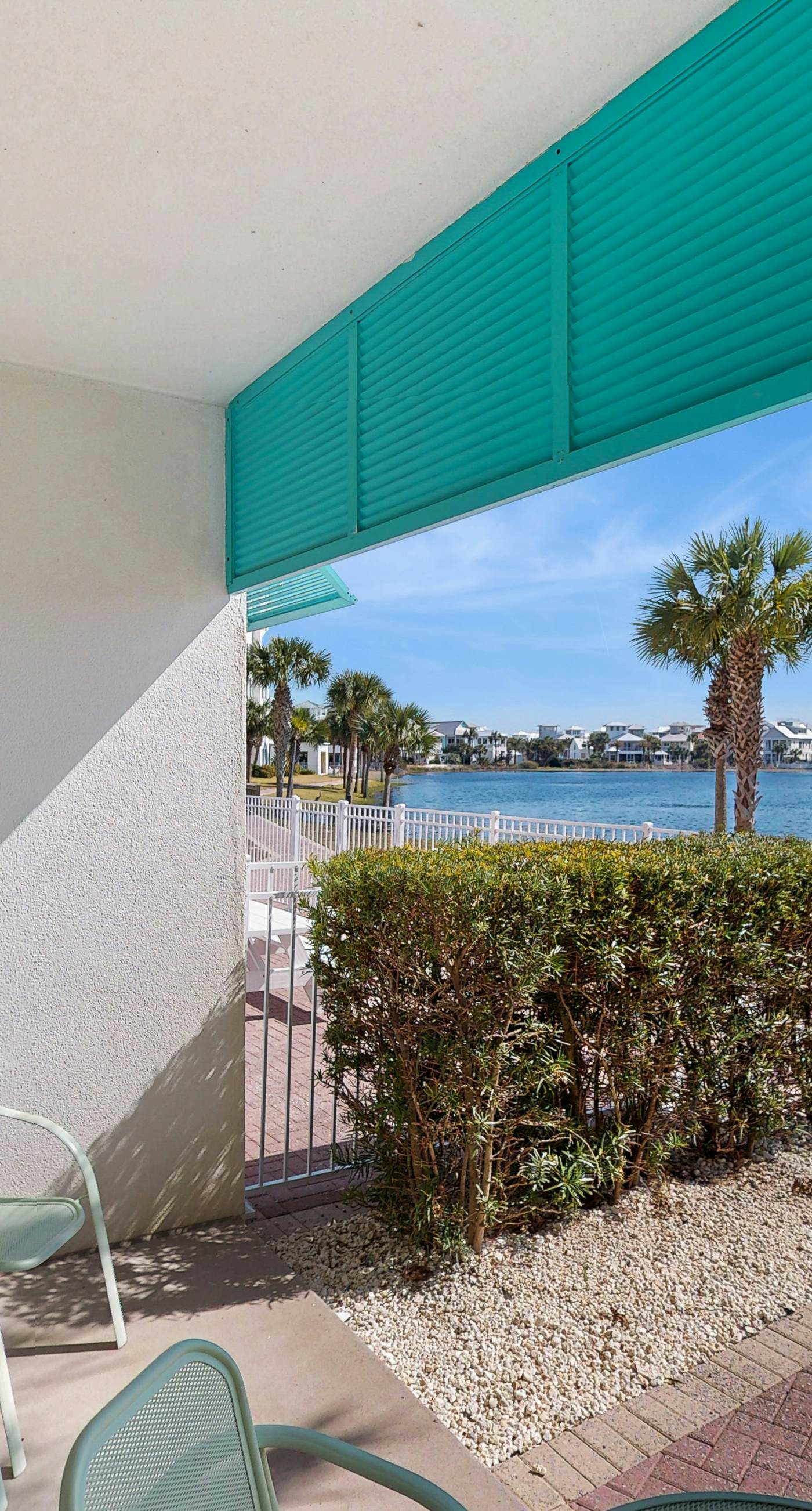 Lakefront dog-friendly condo with water views, pool, hot tub & beach access