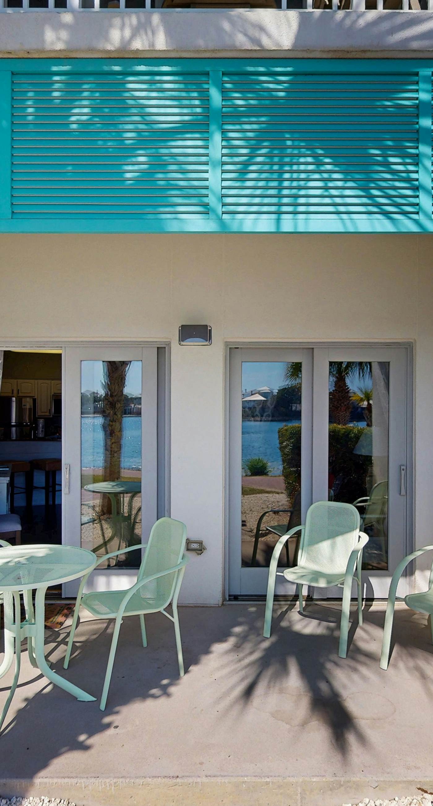 Lakefront dog-friendly condo with water views, pool, hot tub & beach access