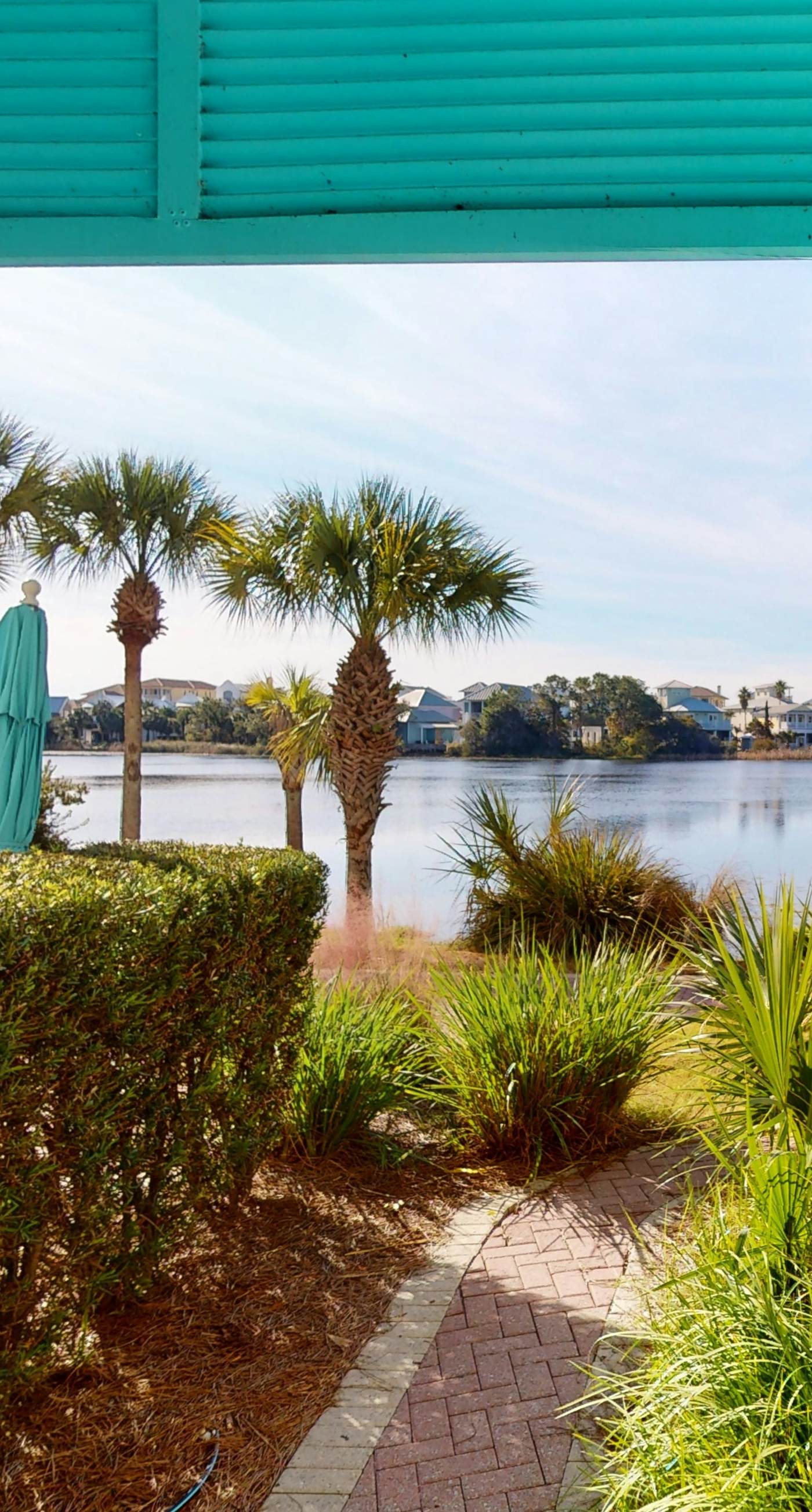 Lakefront dog-friendly condo with water views, pool, hot tub & beach access