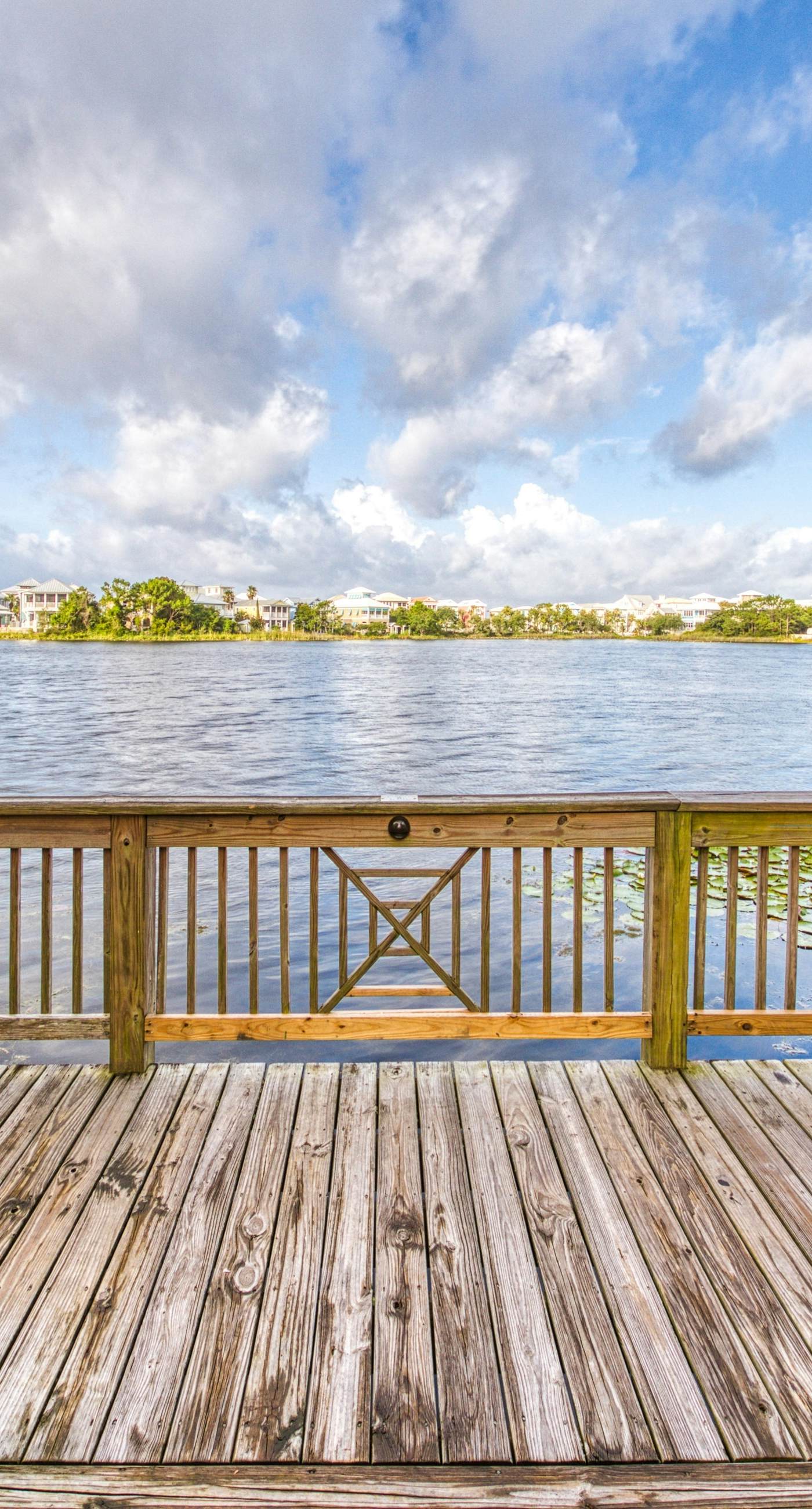 Lakefront dog-friendly condo with water views, pool, hot tub & beach access