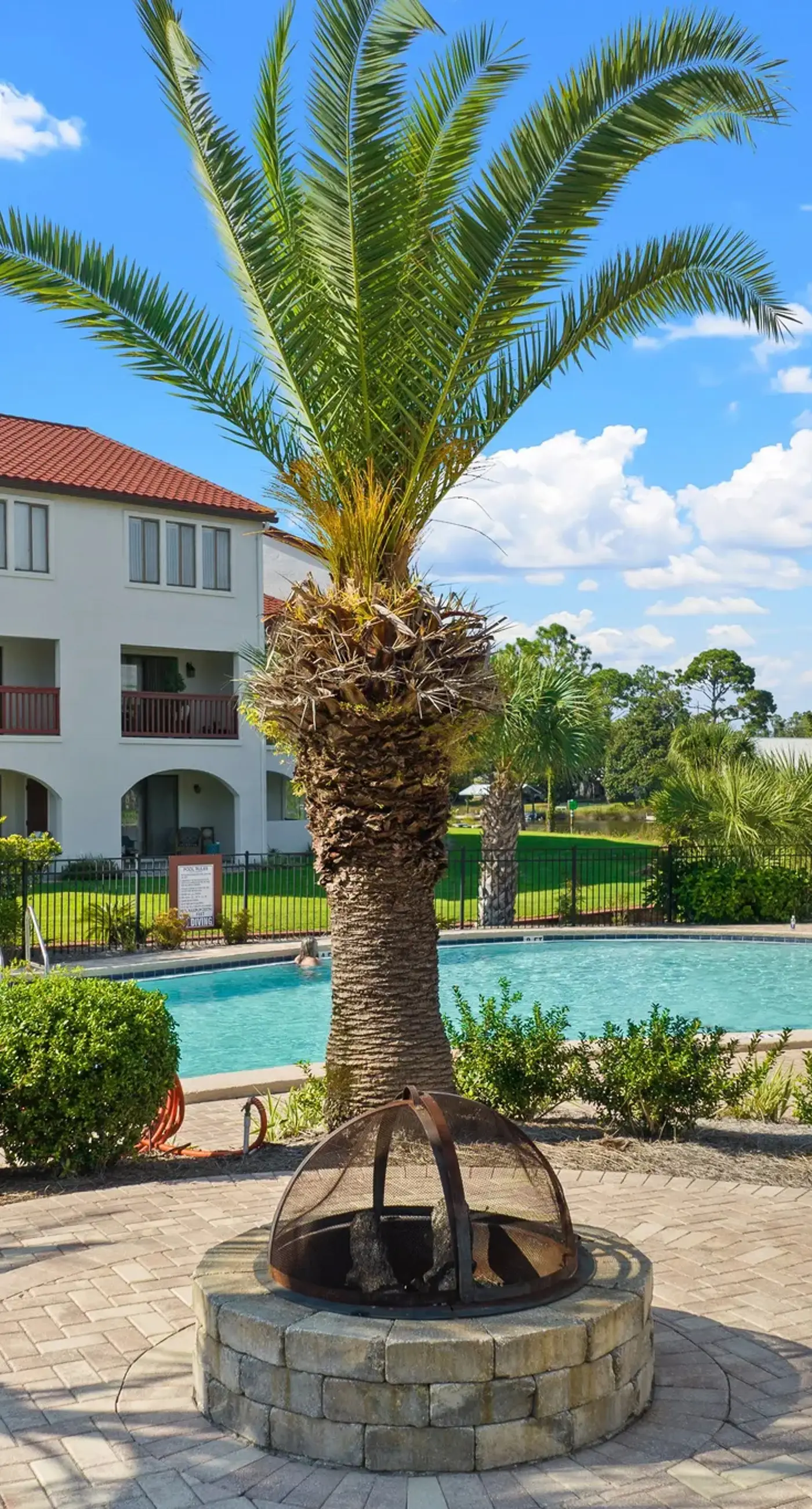 Condo near the water with pool, tennis, balcony, grill, washer/dryer, & AC