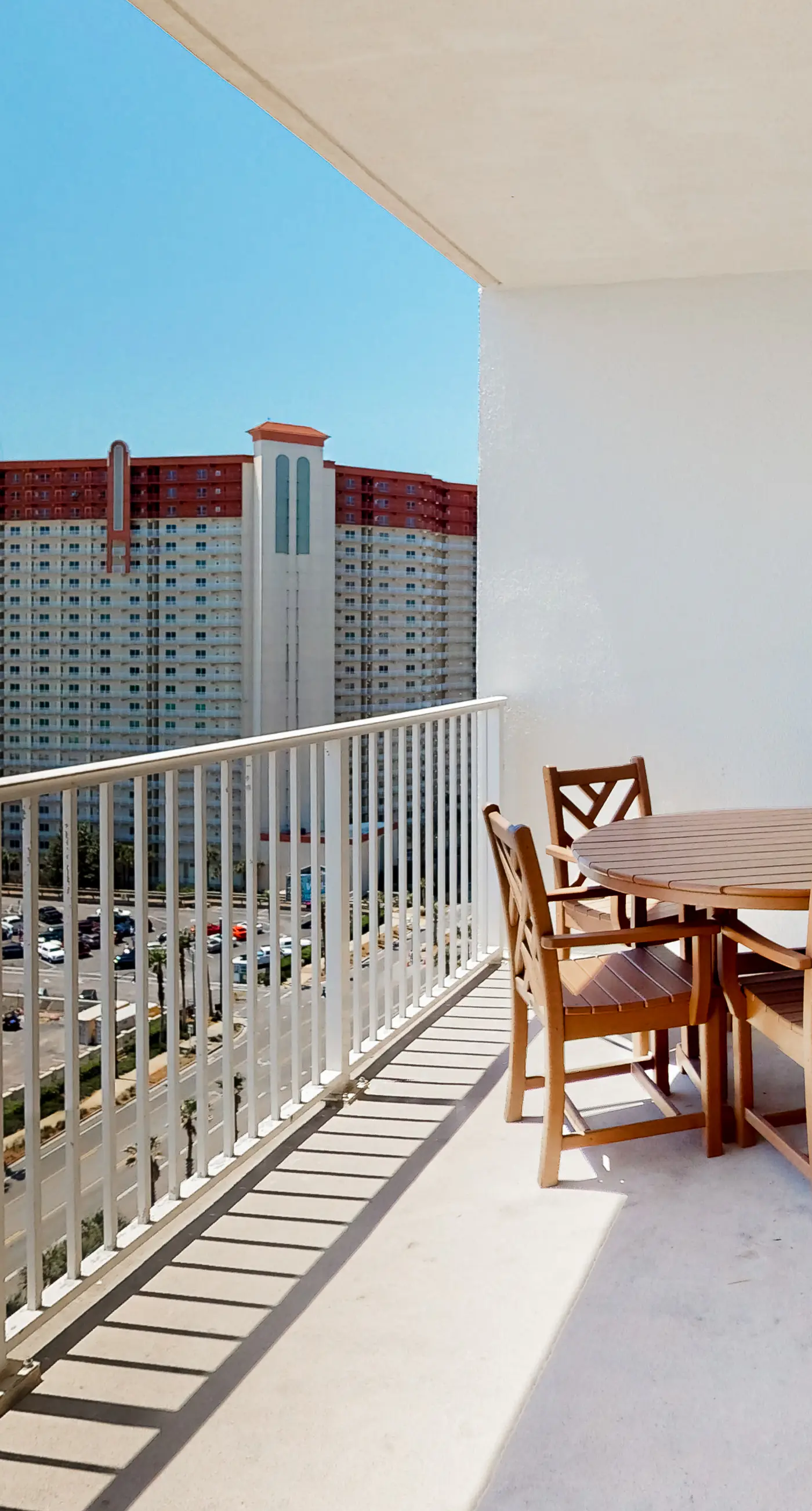 Gulf-view condo steps to beach with balcony, pools, hot tub & gym