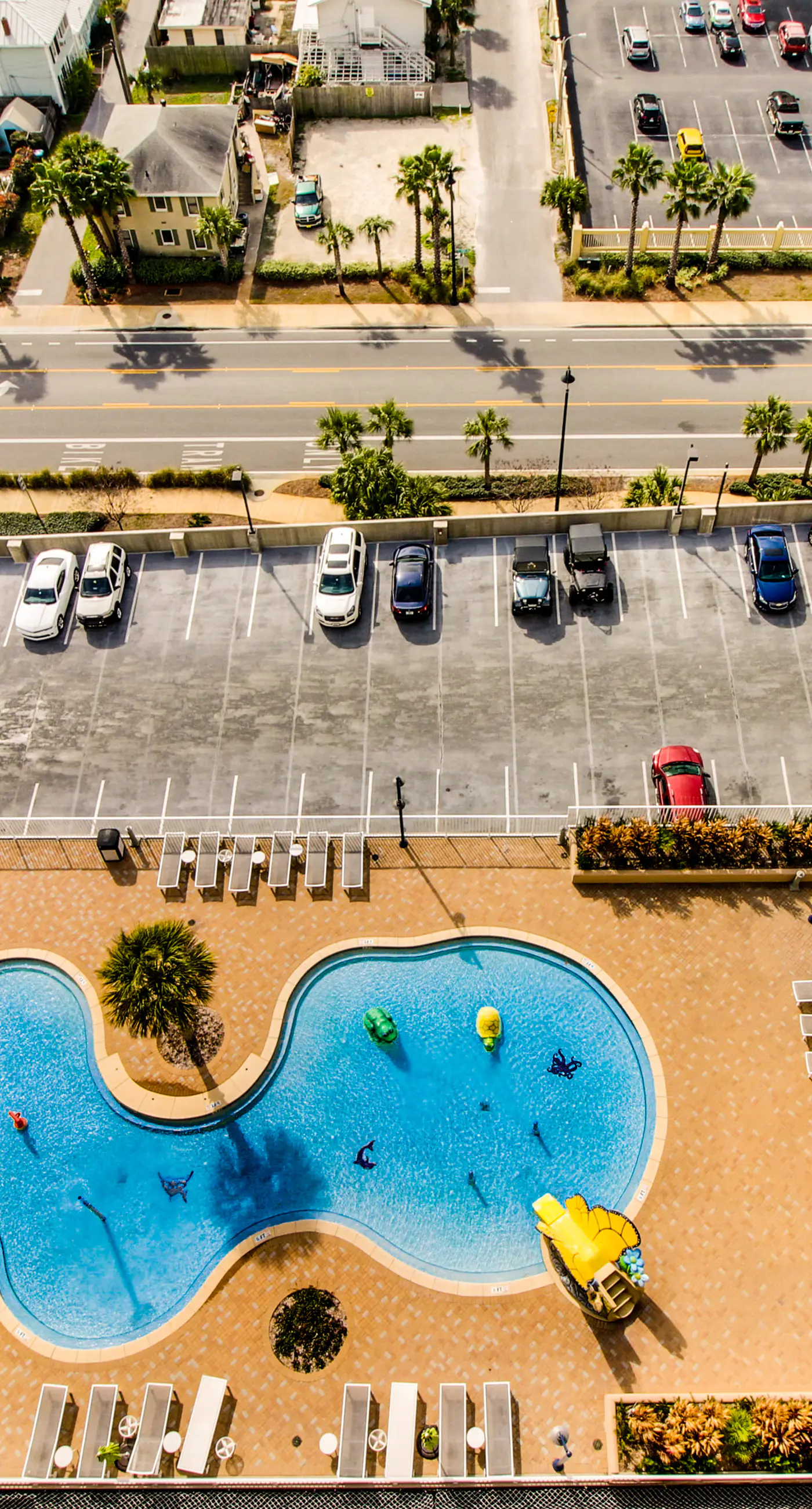 Gulf-view condo steps to beach with balcony, pools, hot tub & gym