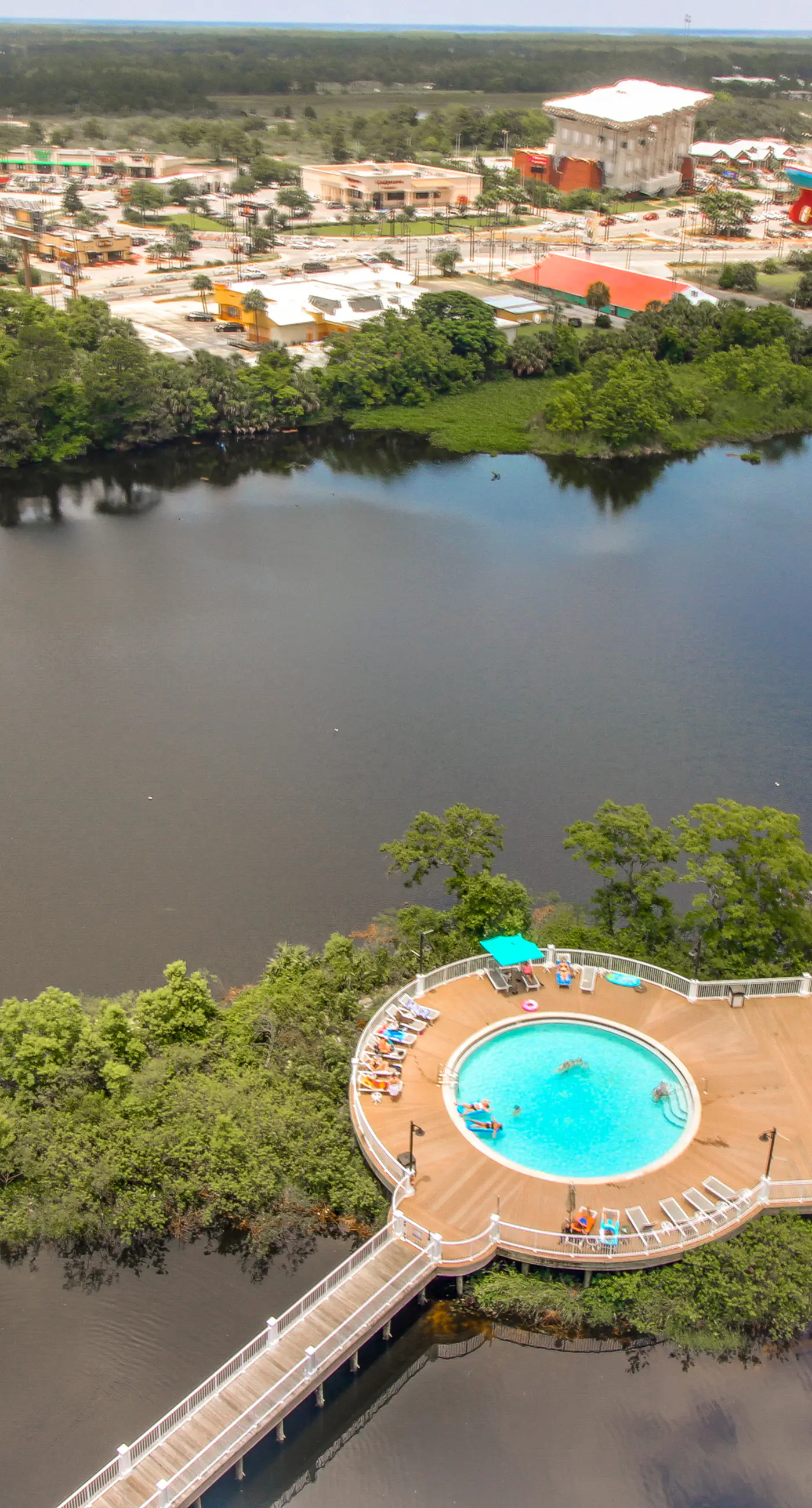 Gulf-view condo steps to beach with balcony, pools, hot tub & gym