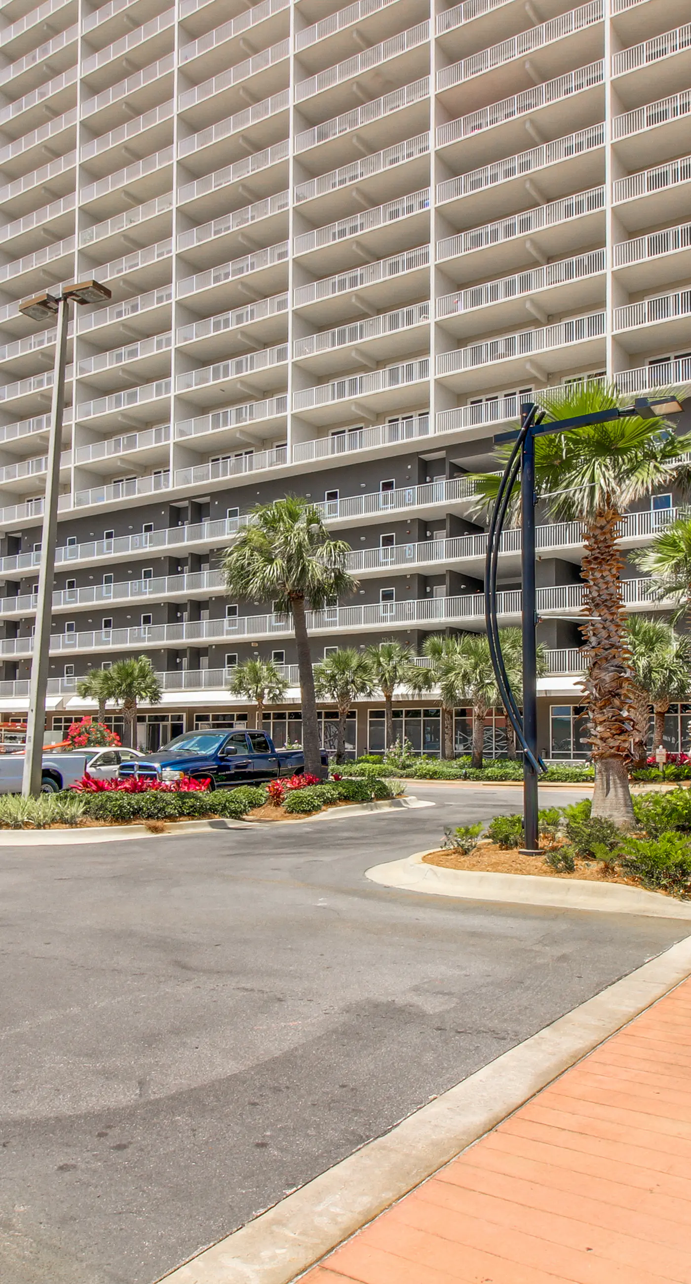 Gulf-view condo steps to beach with balcony, pools, hot tub & gym