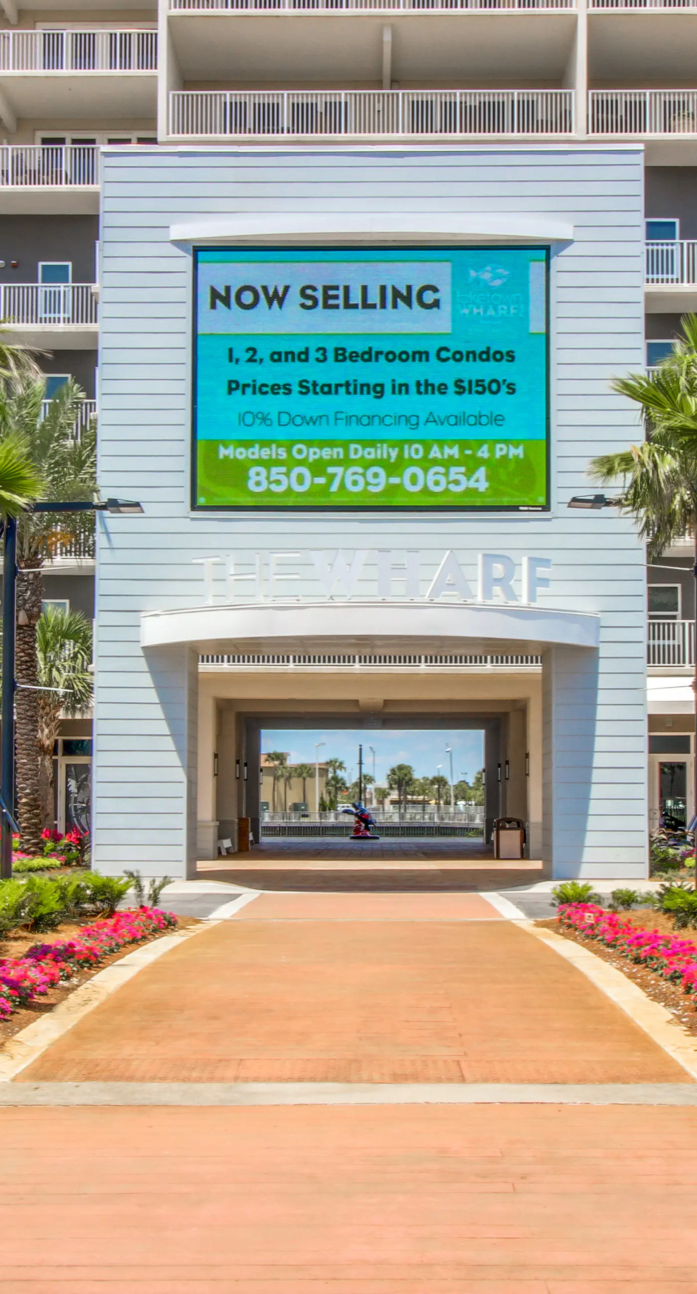 Gulf-view condo steps to beach with balcony, pools, hot tub & gym