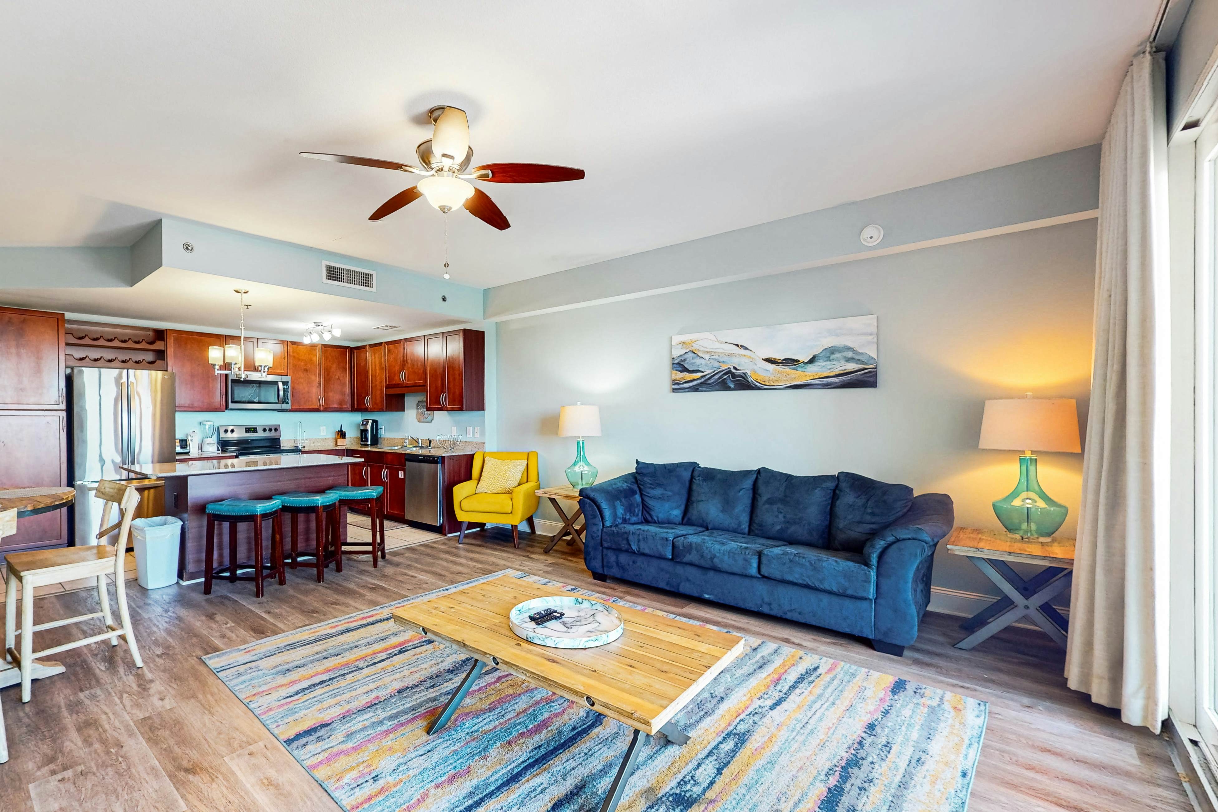 Spacious condo with private balcony, shared pool & beach access