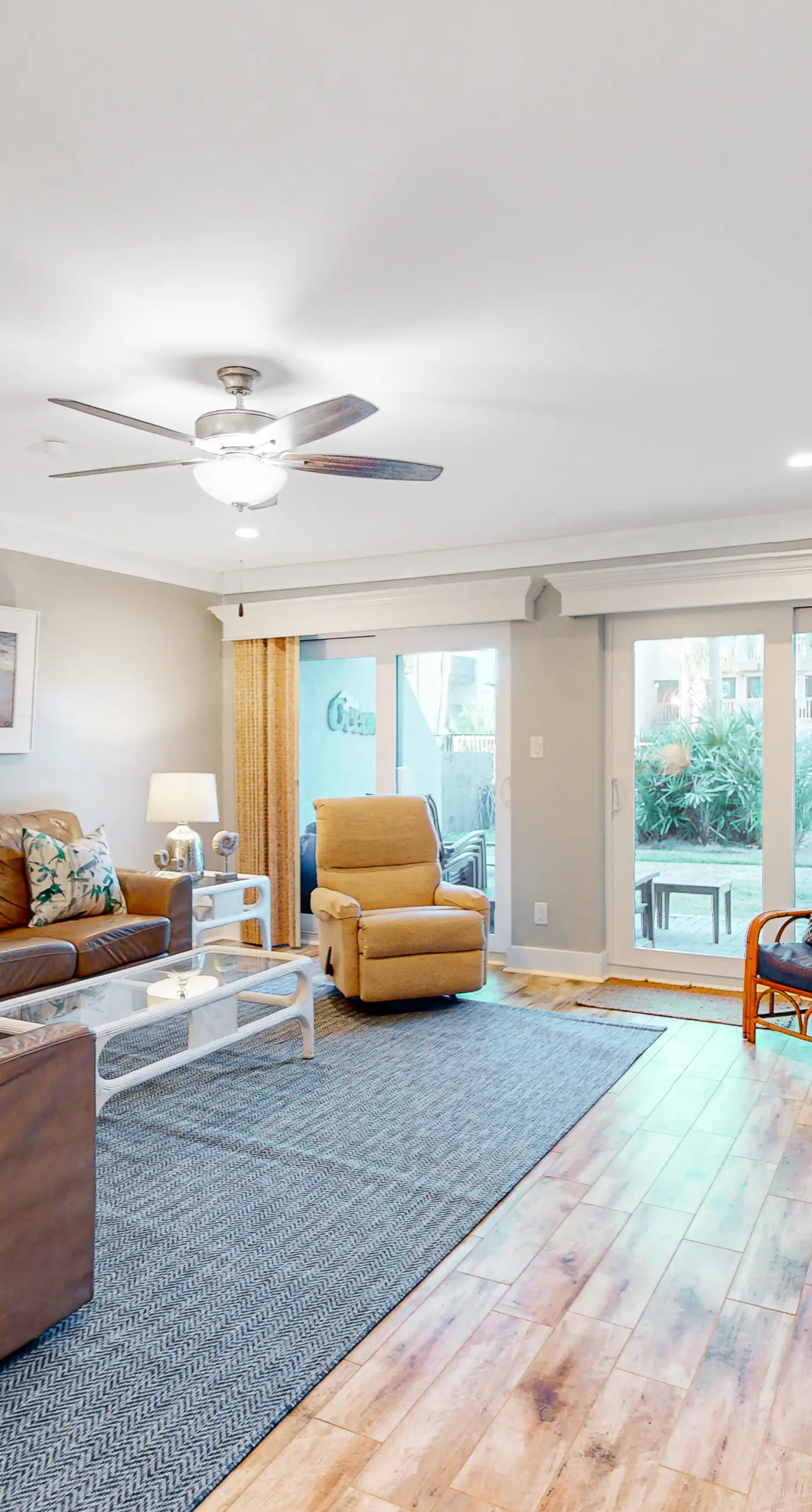 Three-story condo in beachfront complex with patios, balconies, pool & hot tub