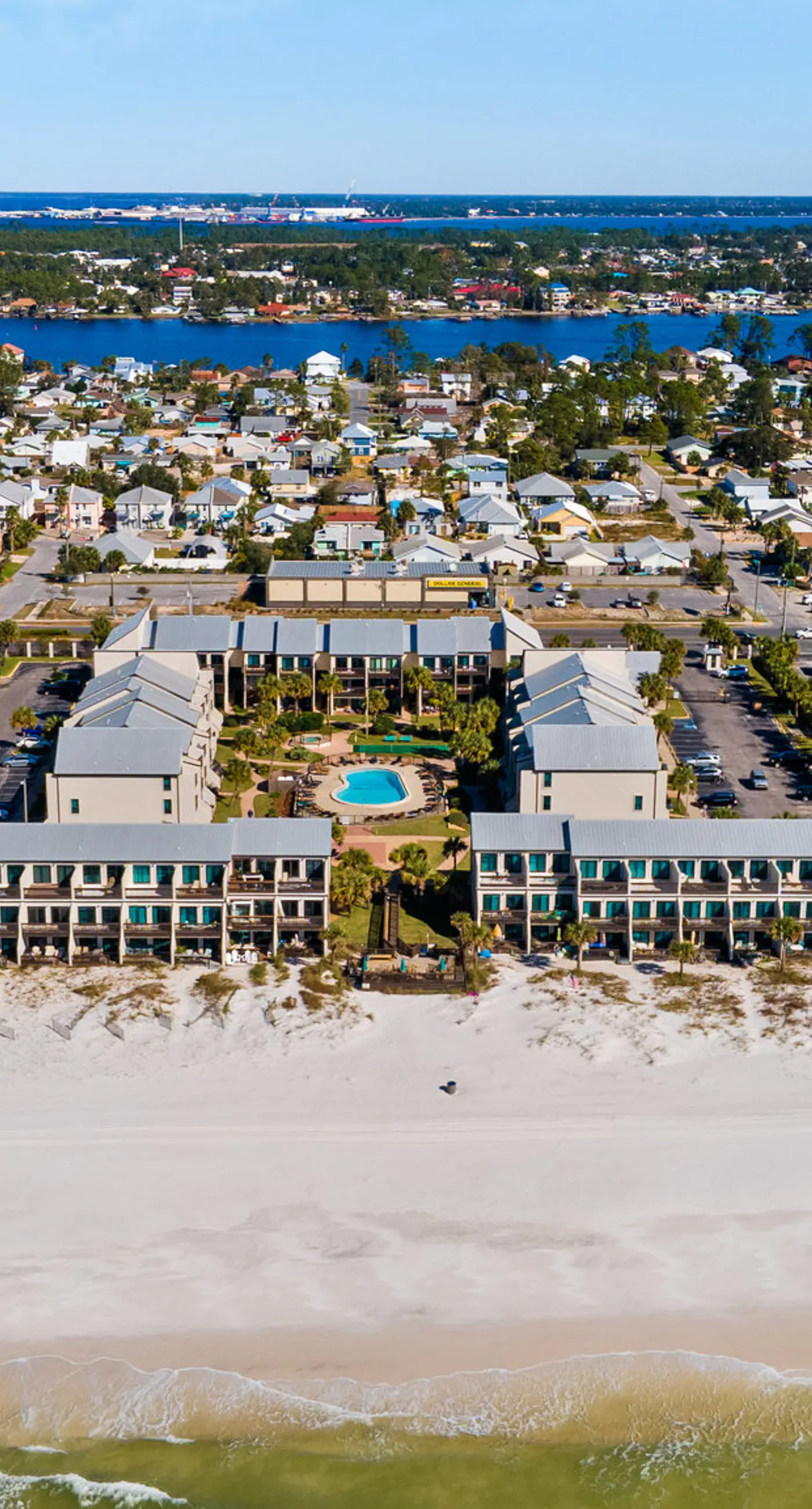 Three-story condo in beachfront complex with patios, balconies, pool & hot tub
