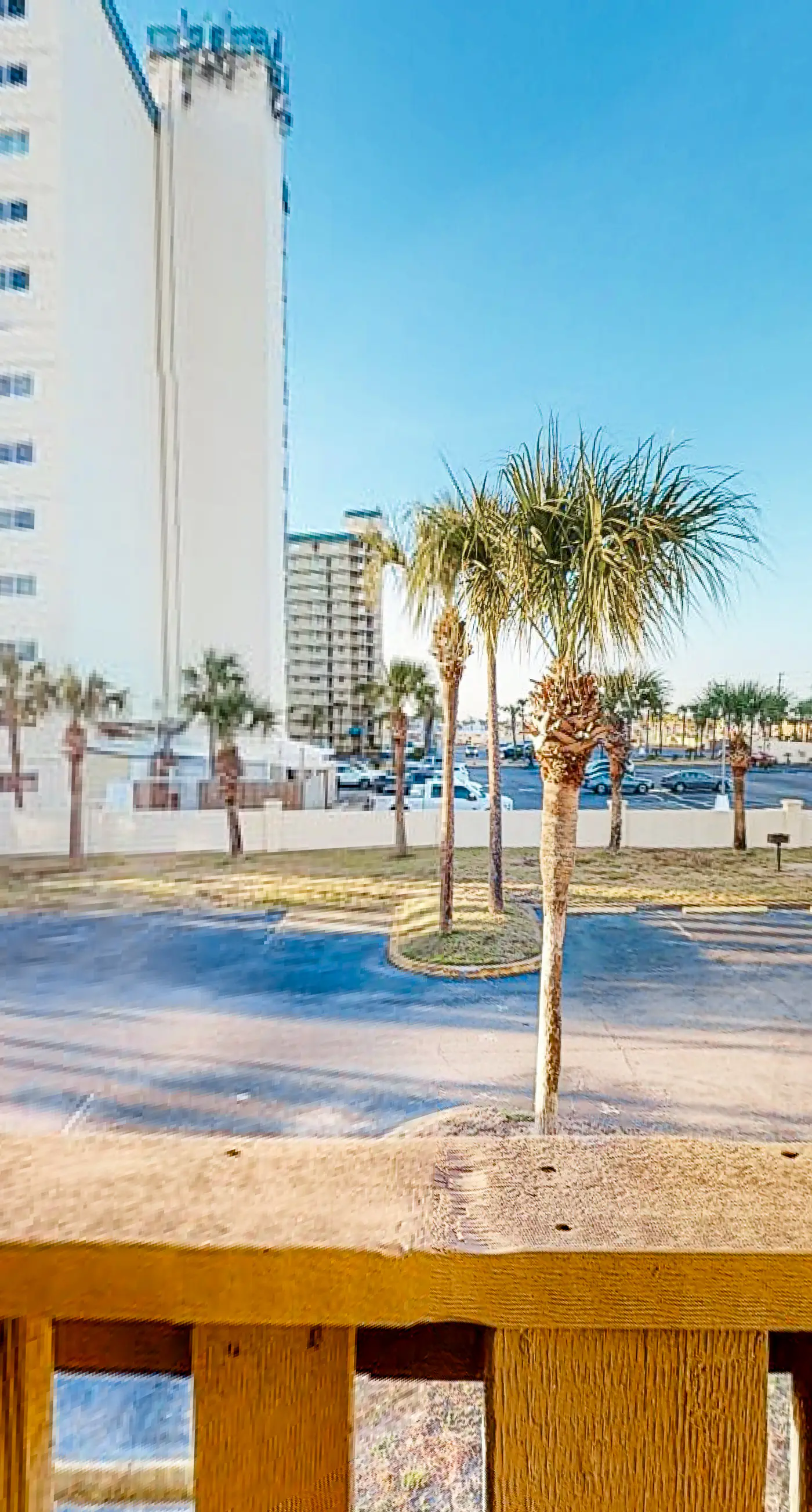 Three-story condo in beachfront complex with patios, balconies, pool & hot tub