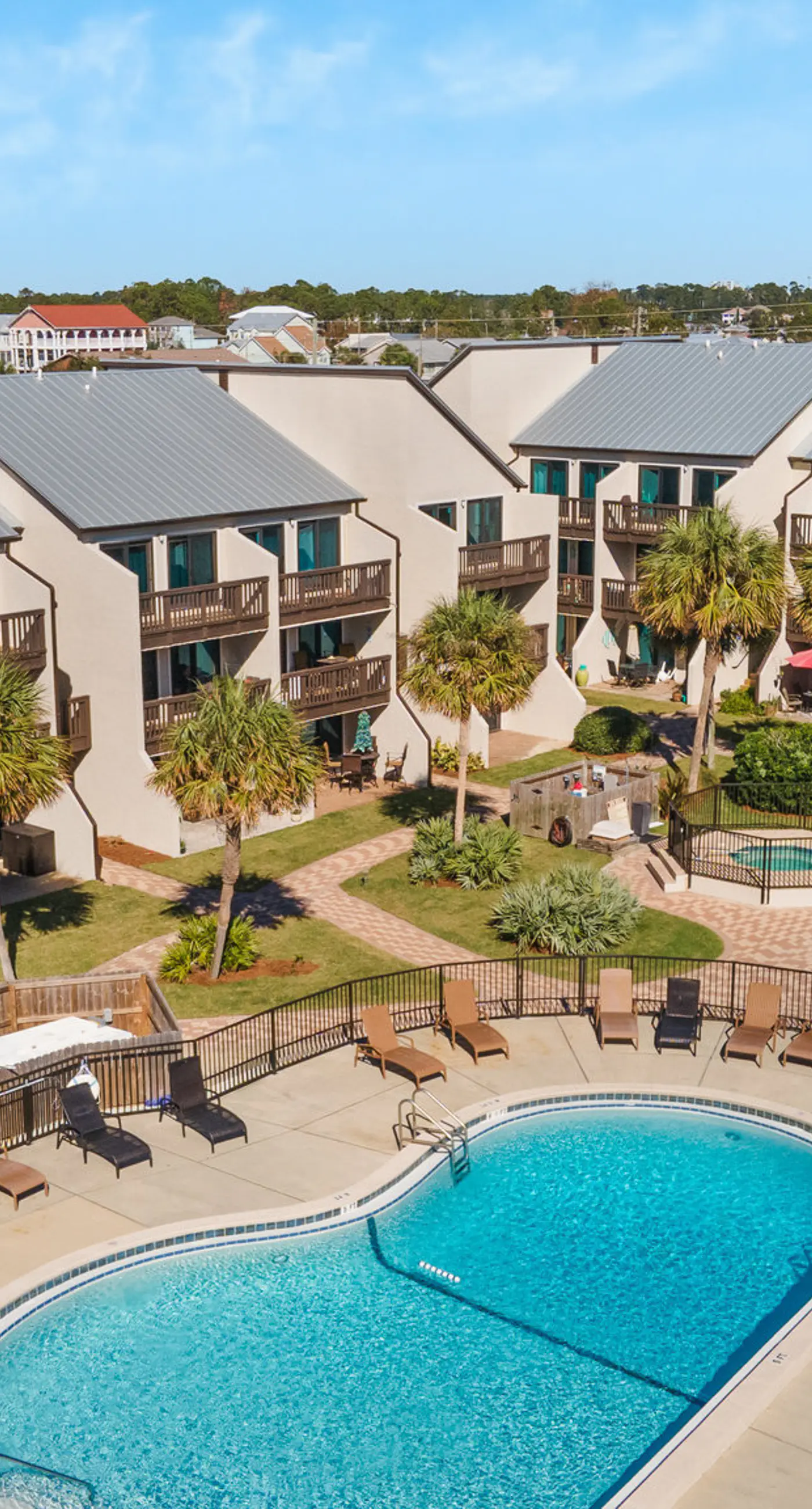 Three-story condo in beachfront complex with patios, balconies, pool & hot tub