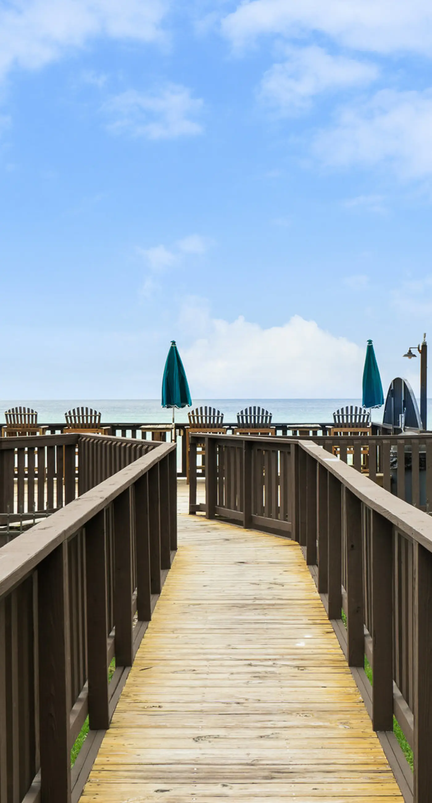 Three-story condo in beachfront complex with patios, balconies, pool & hot tub