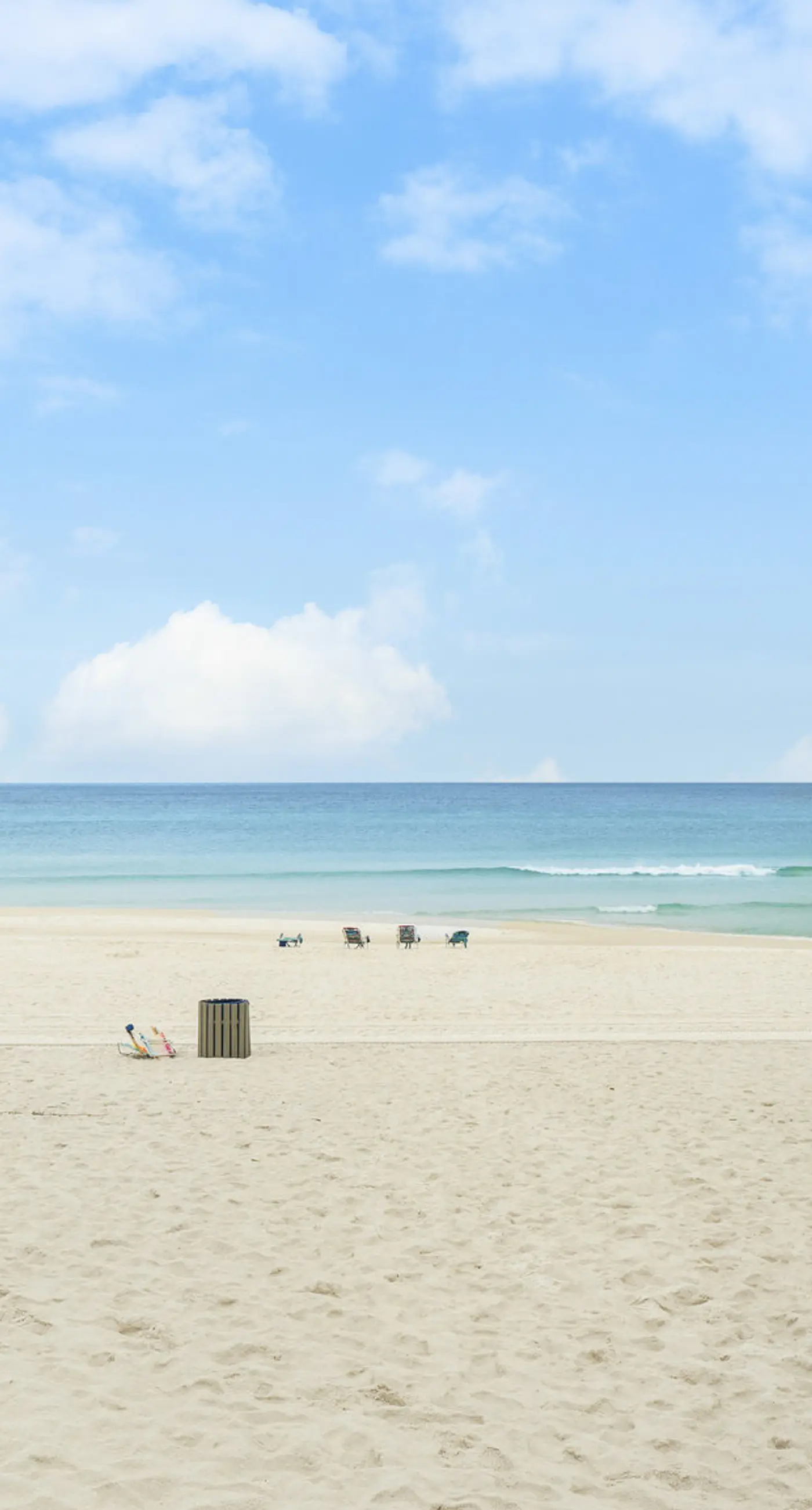 Three-story condo in beachfront complex with patios, balconies, pool & hot tub