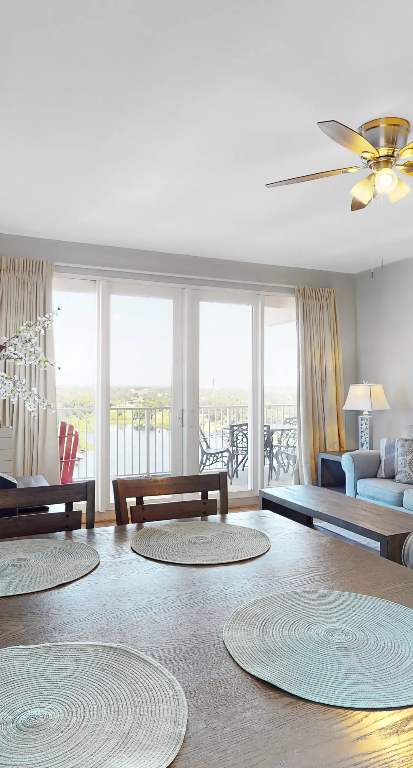 Inviting waterfront condo with pool, hot tub, beach access, balcony, & W/D