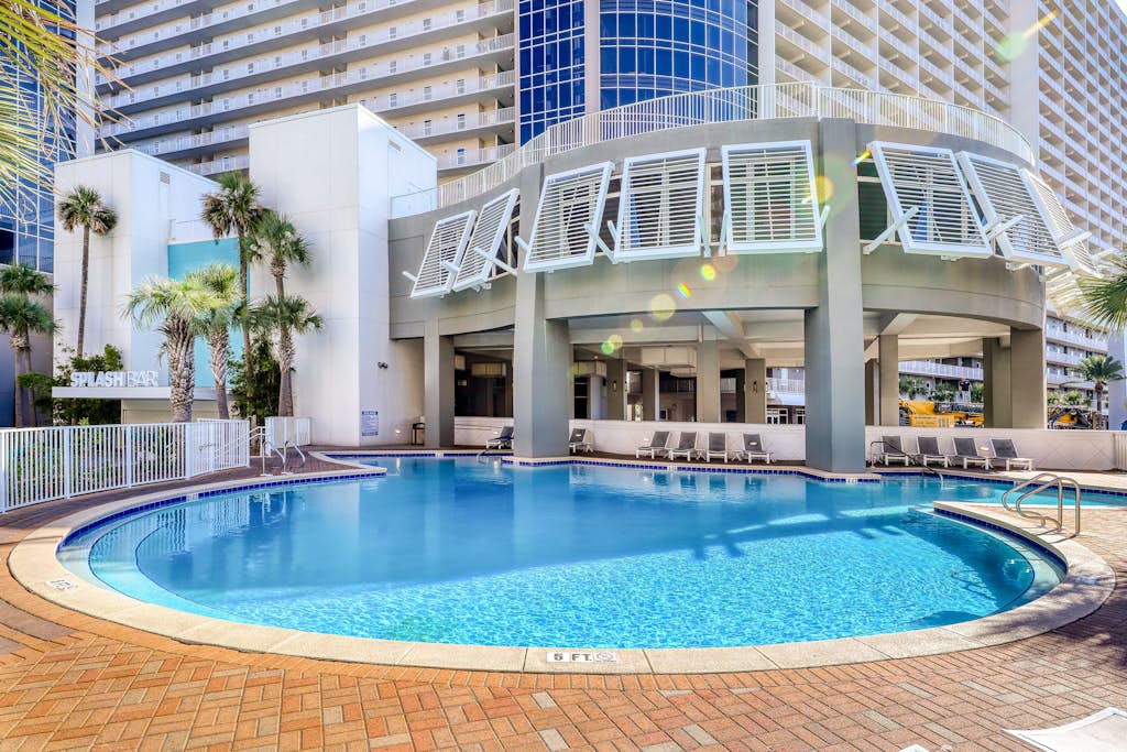 14th floor condo with pool & hot tub access, ocean view, WiFi, W/D, & central AC