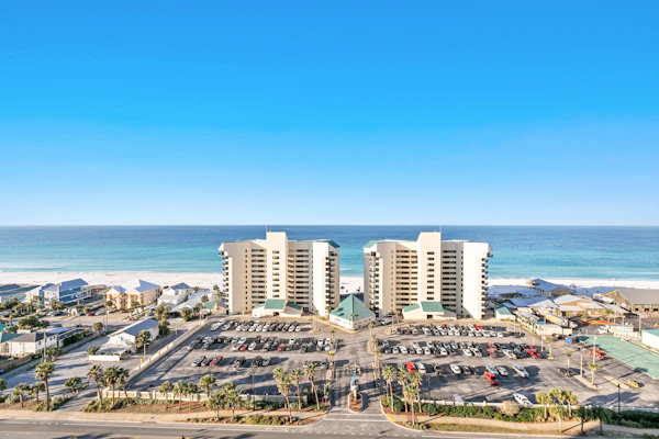 14th floor condo with pool & hot tub access, ocean view, WiFi, W/D, & central AC