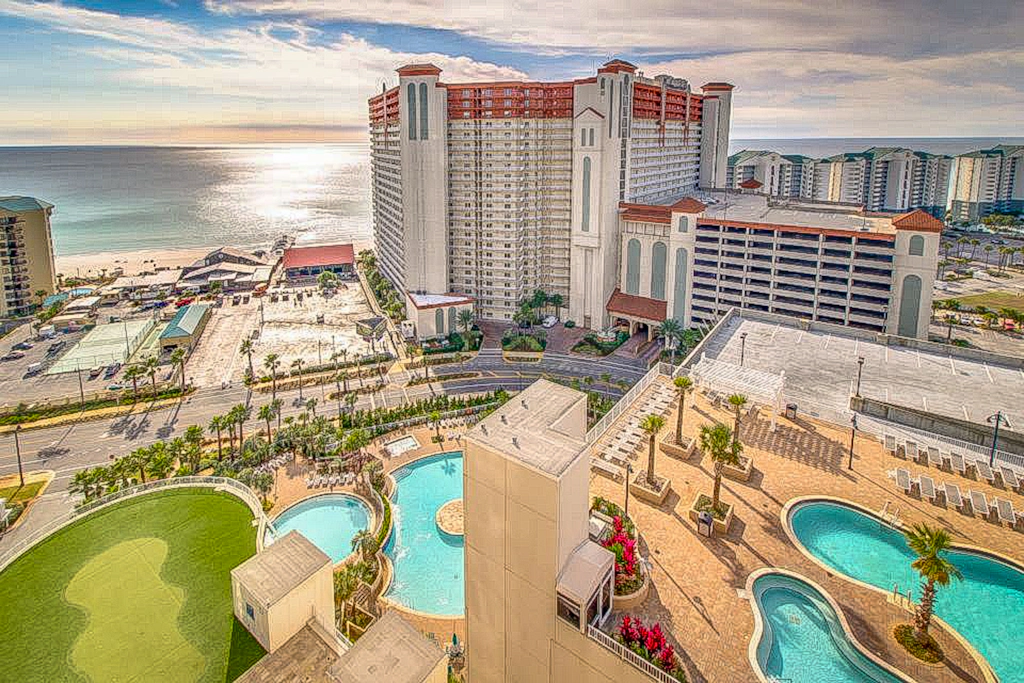 Gorgeous coastal condo with shared pool and private patio