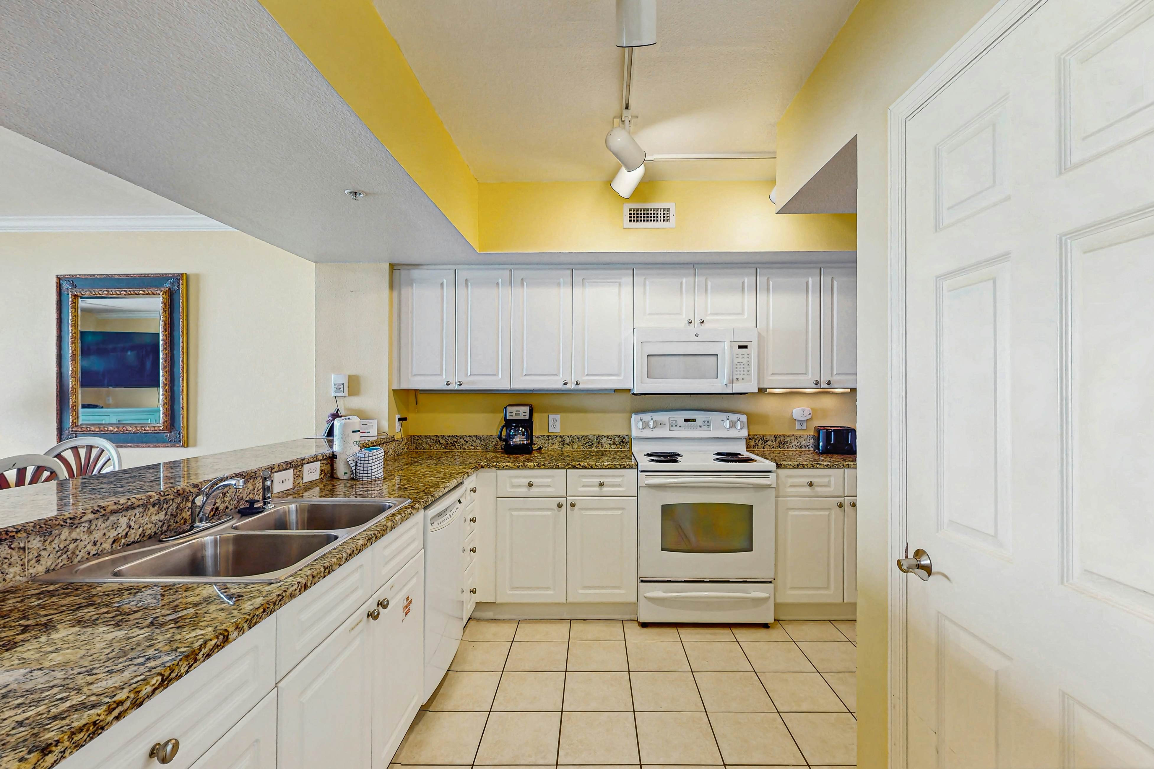 Roomy retreat on the water with private balcony, shared pool, & beach access