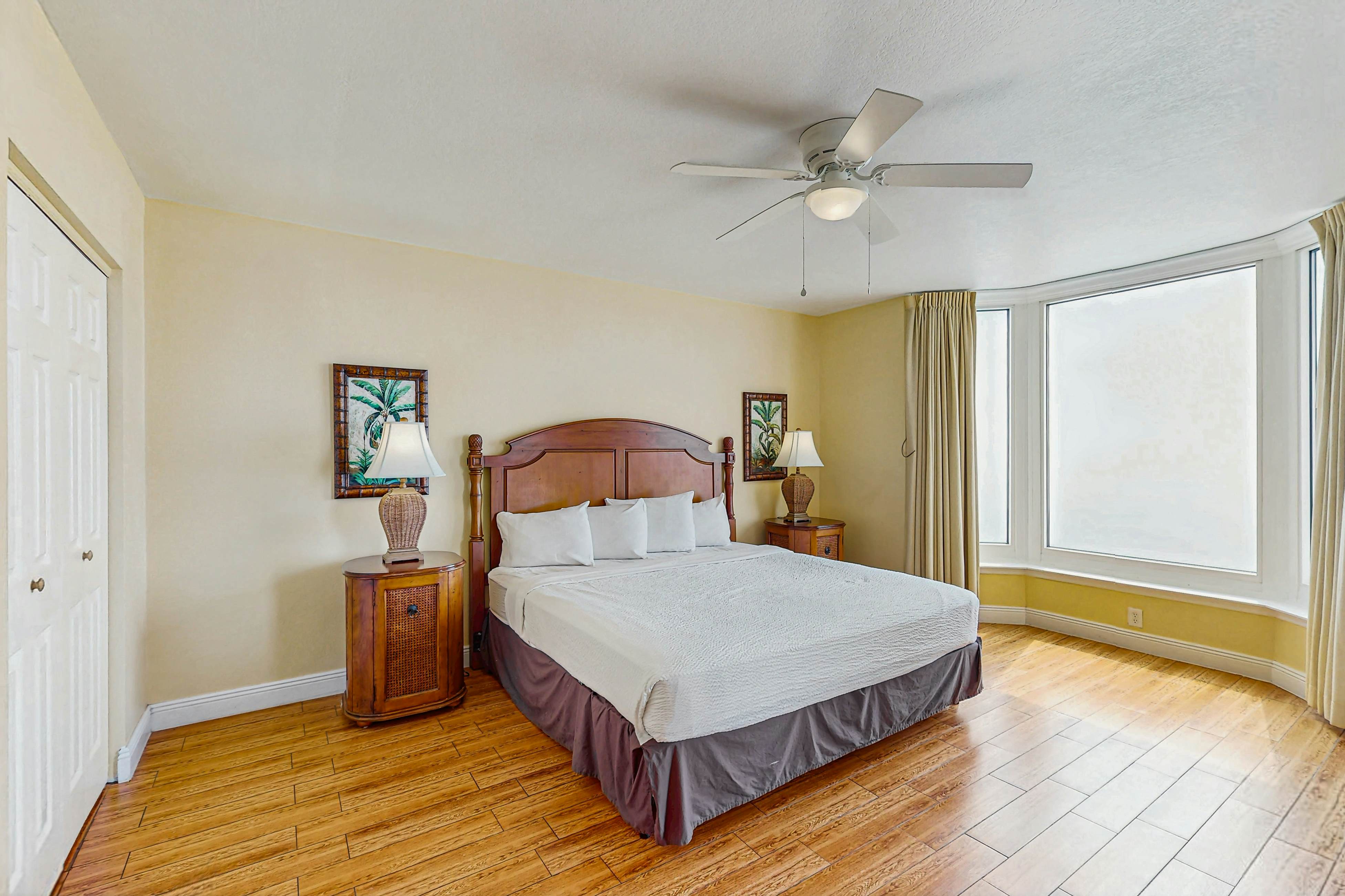 Roomy retreat on the water with private balcony, shared pool, & beach access