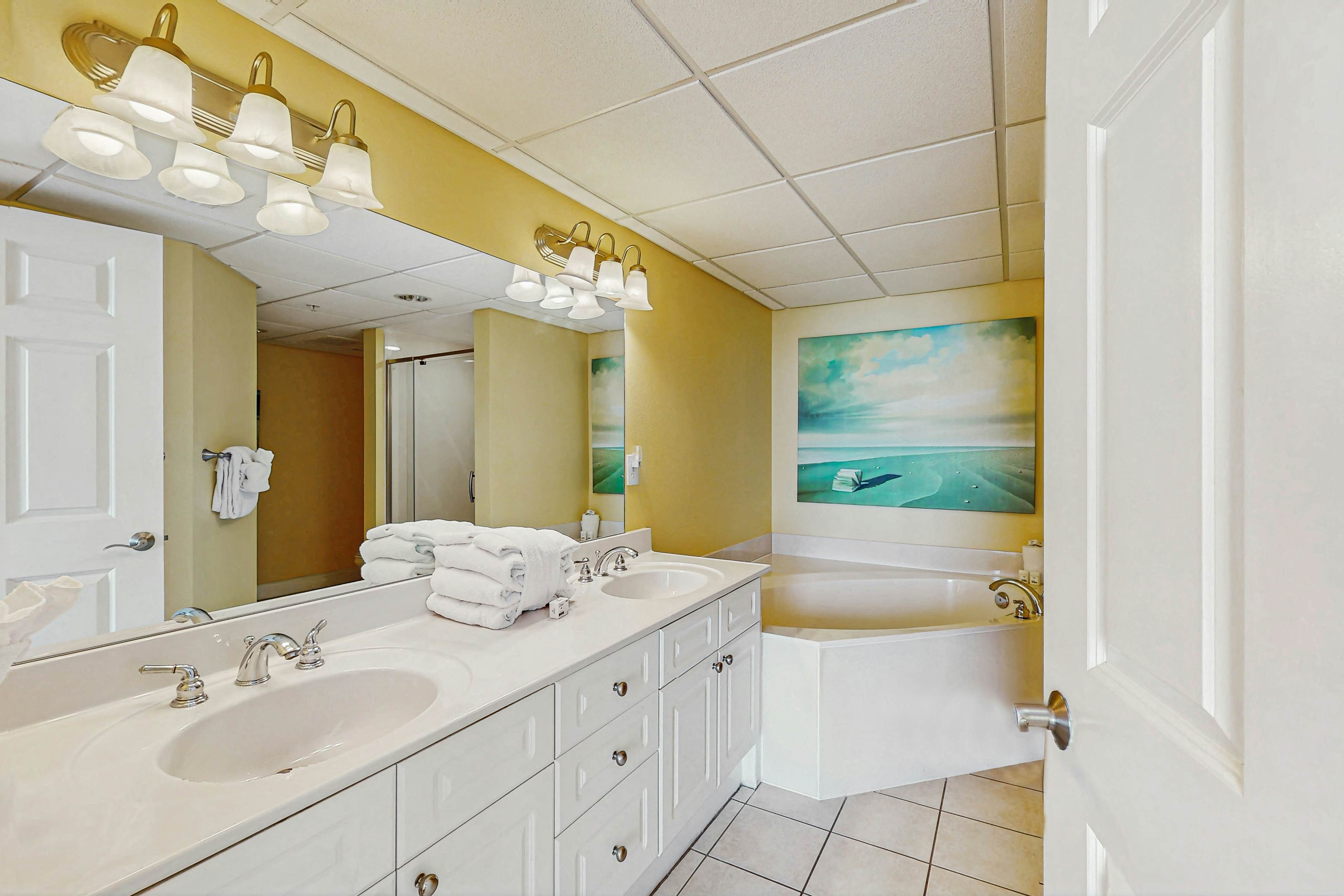 Roomy retreat on the water with private balcony, shared pool, & beach access