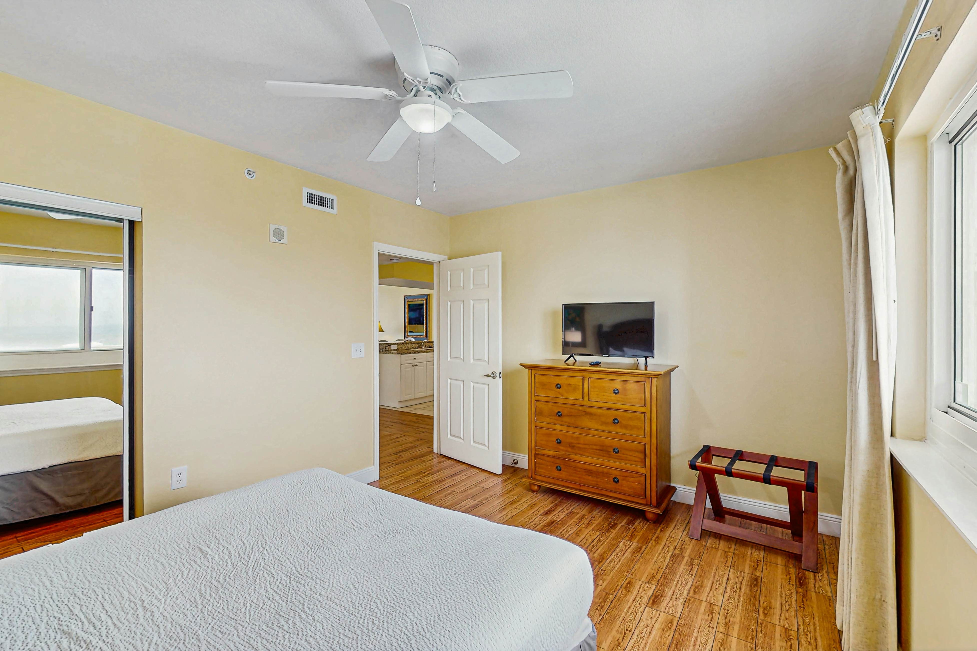 Roomy retreat on the water with private balcony, shared pool, & beach access