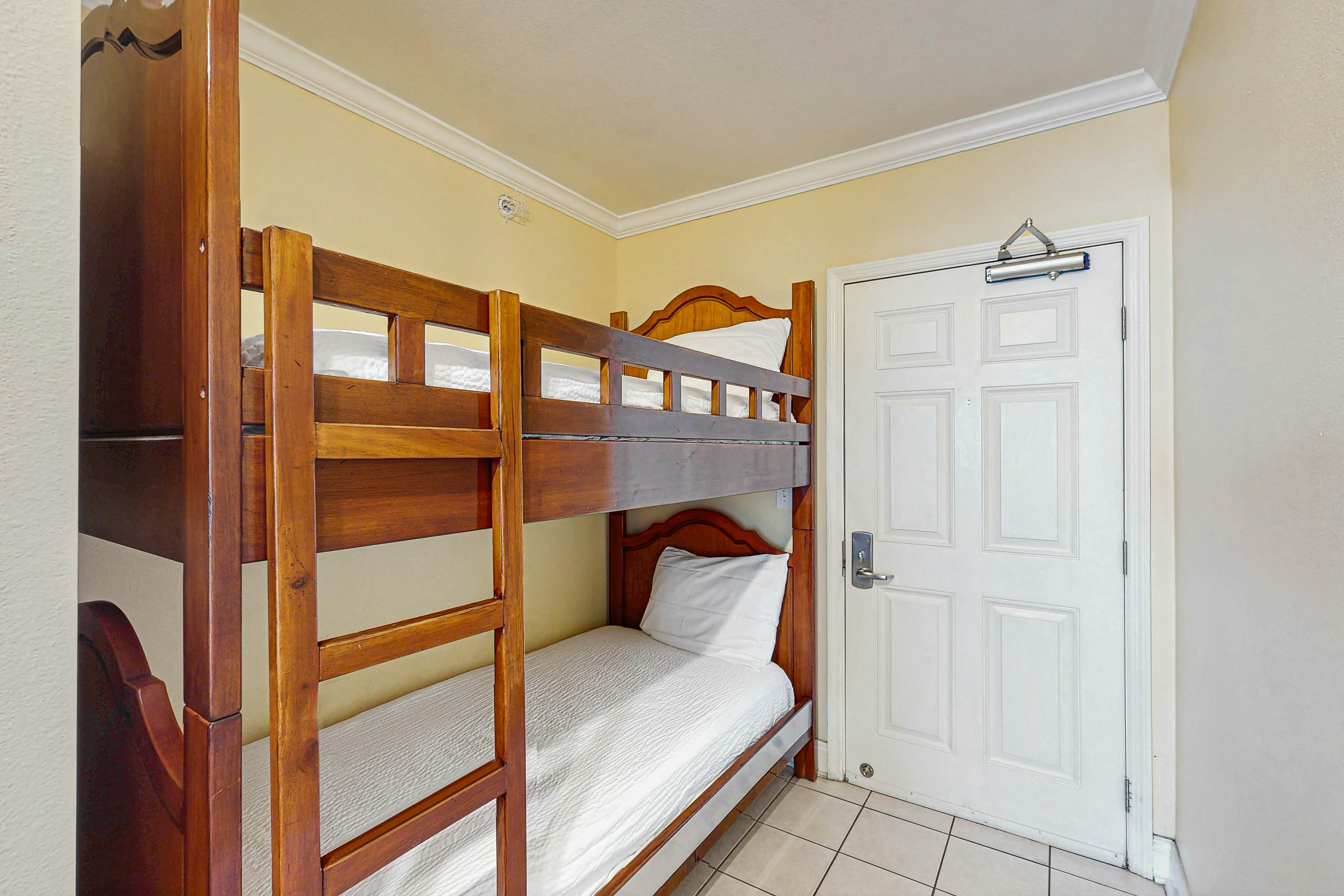 Roomy retreat on the water with private balcony, shared pool, & beach access