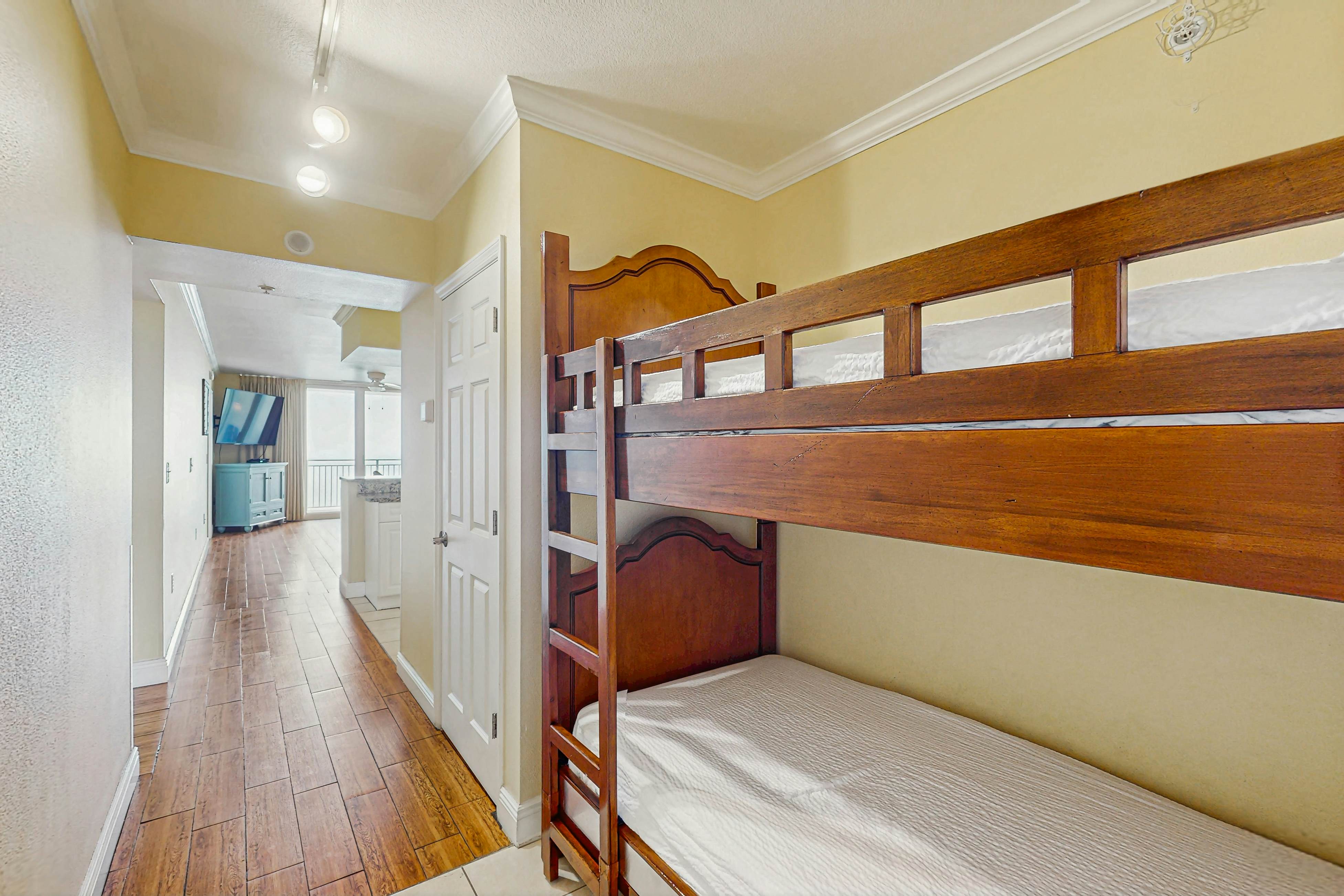 Roomy retreat on the water with private balcony, shared pool, & beach access