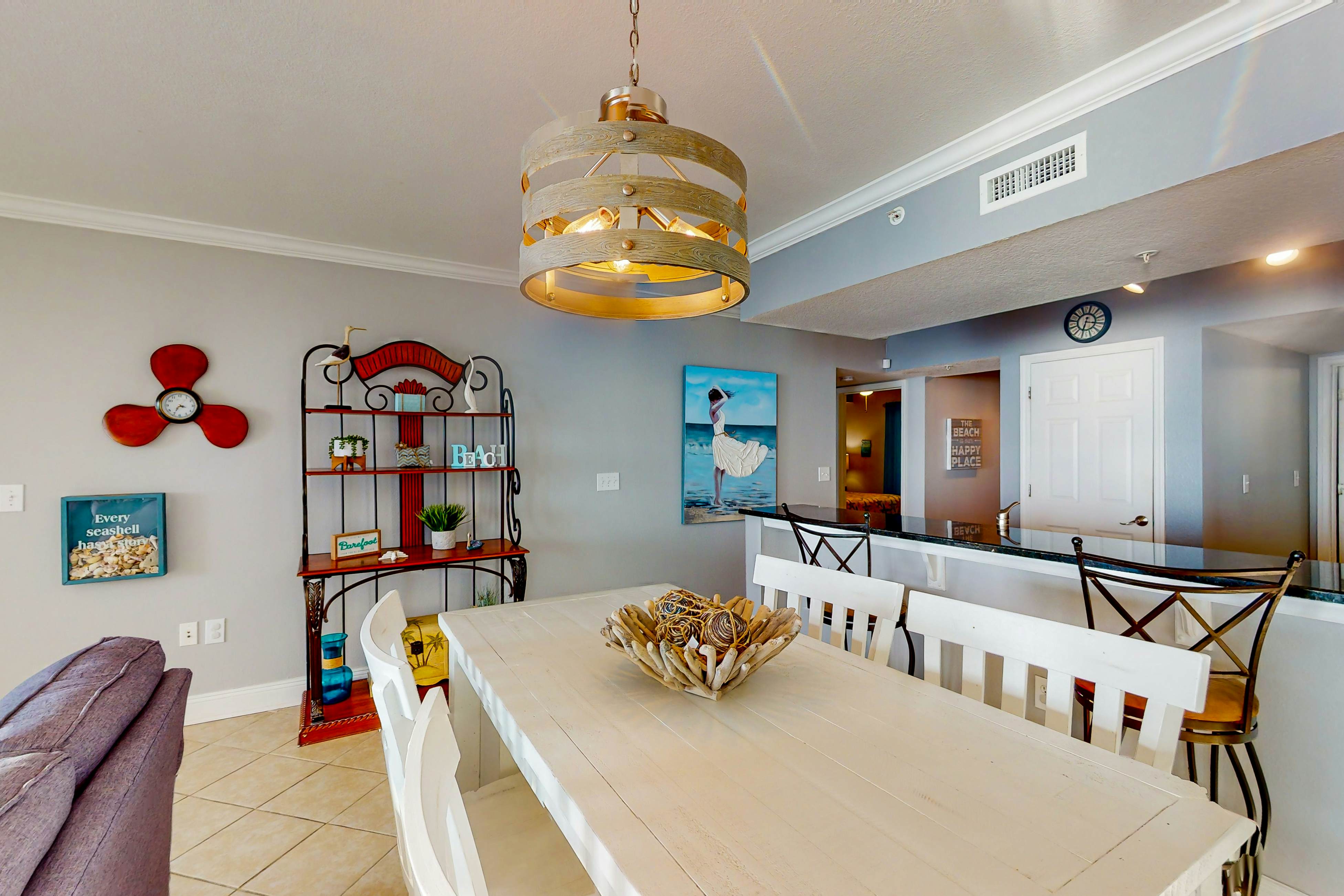 Resort condo on the beach with Gulf views, pools, hot tub, gym & game room