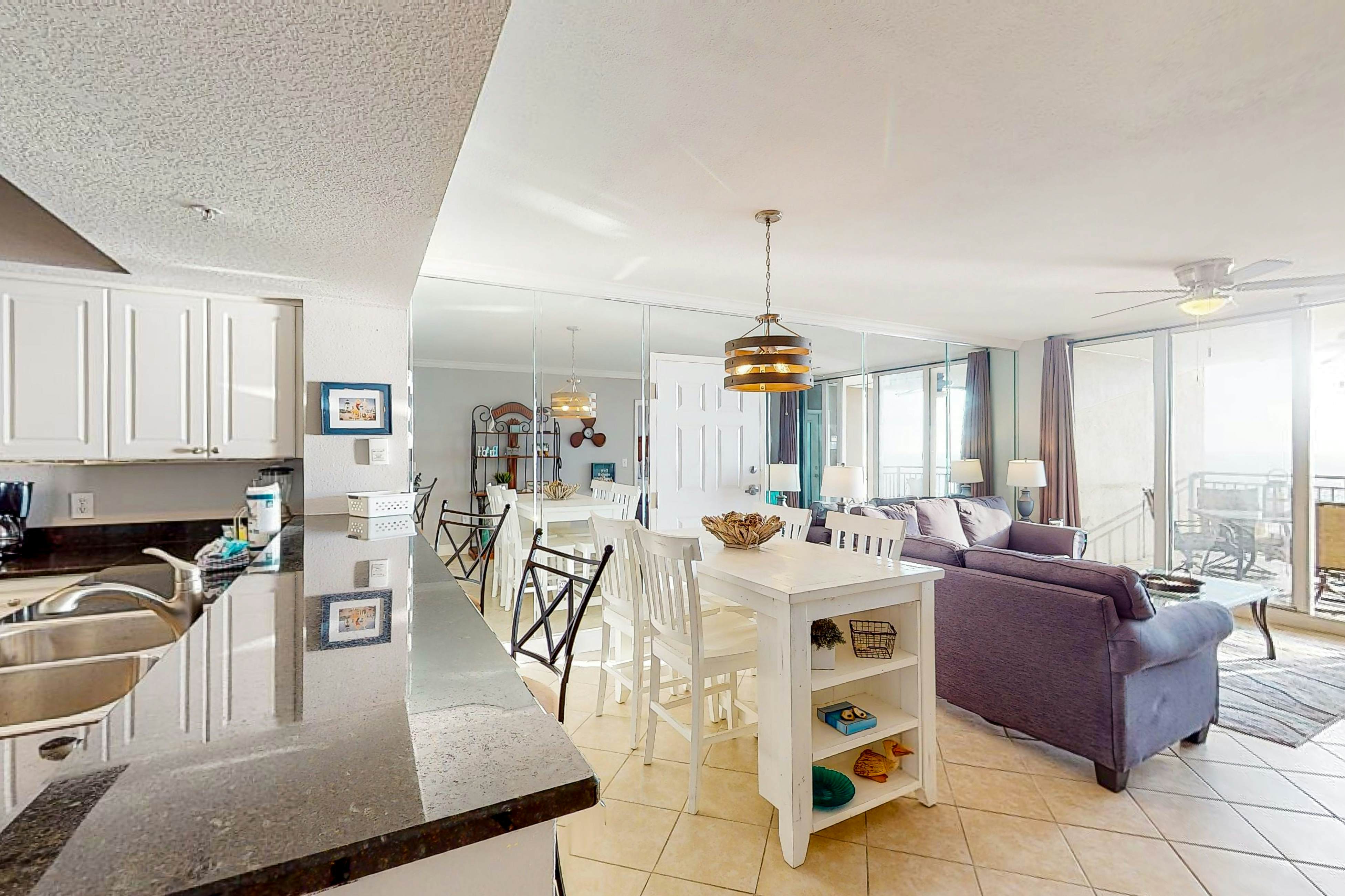 Resort condo on the beach with Gulf views, pools, hot tub, gym & game room