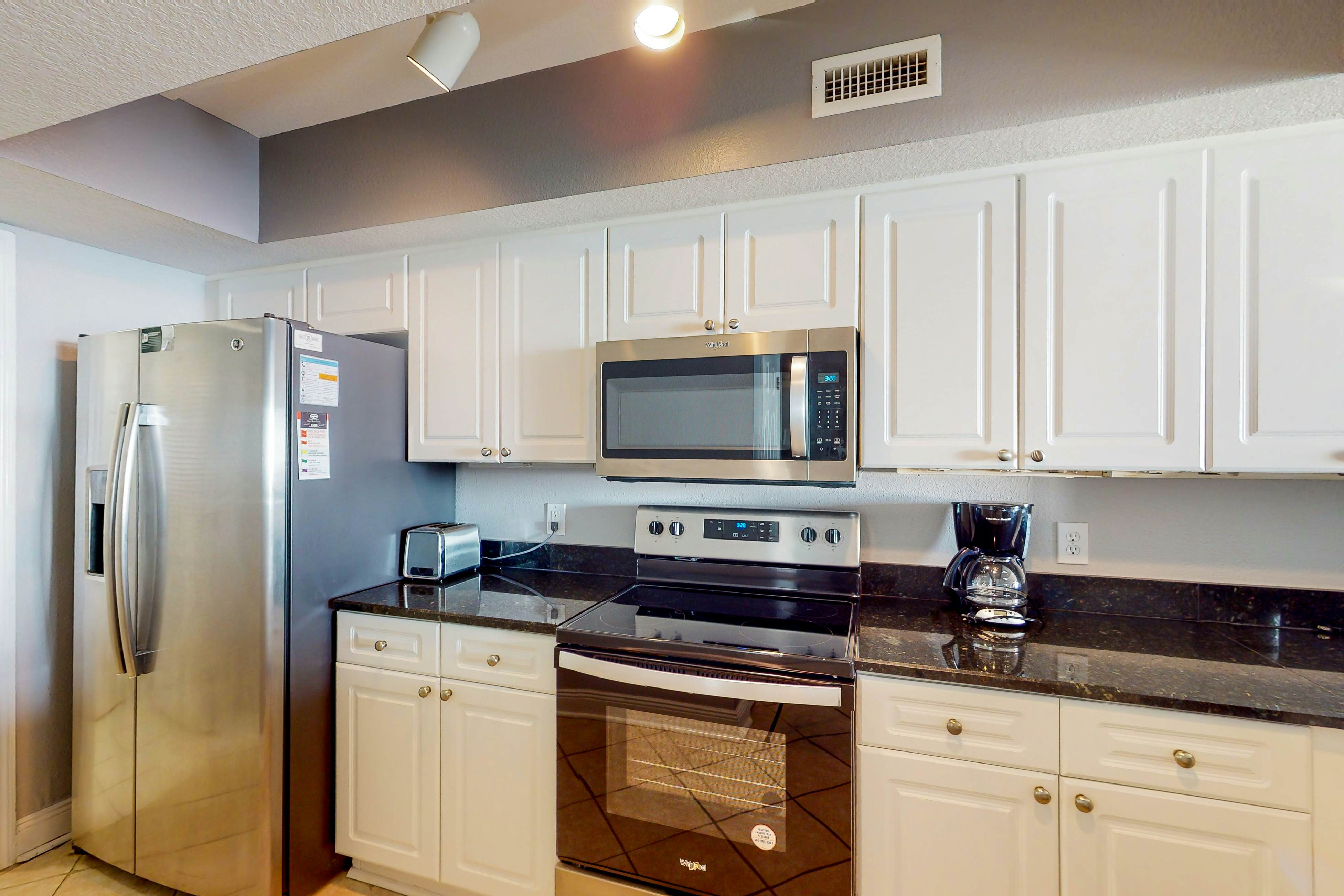 Resort condo on the beach with Gulf views, pools, hot tub, gym & game room