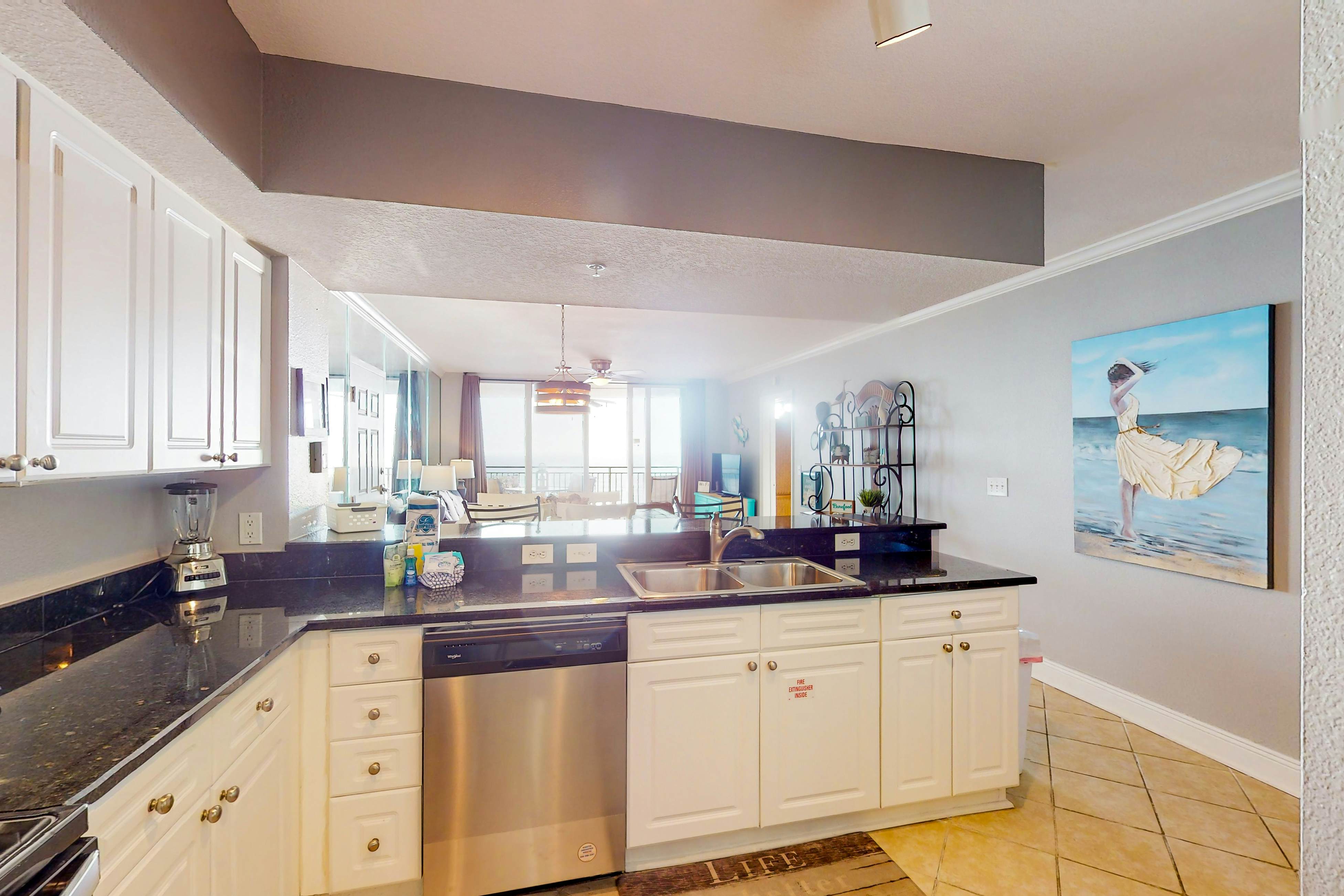 Resort condo on the beach with Gulf views, pools, hot tub, gym & game room