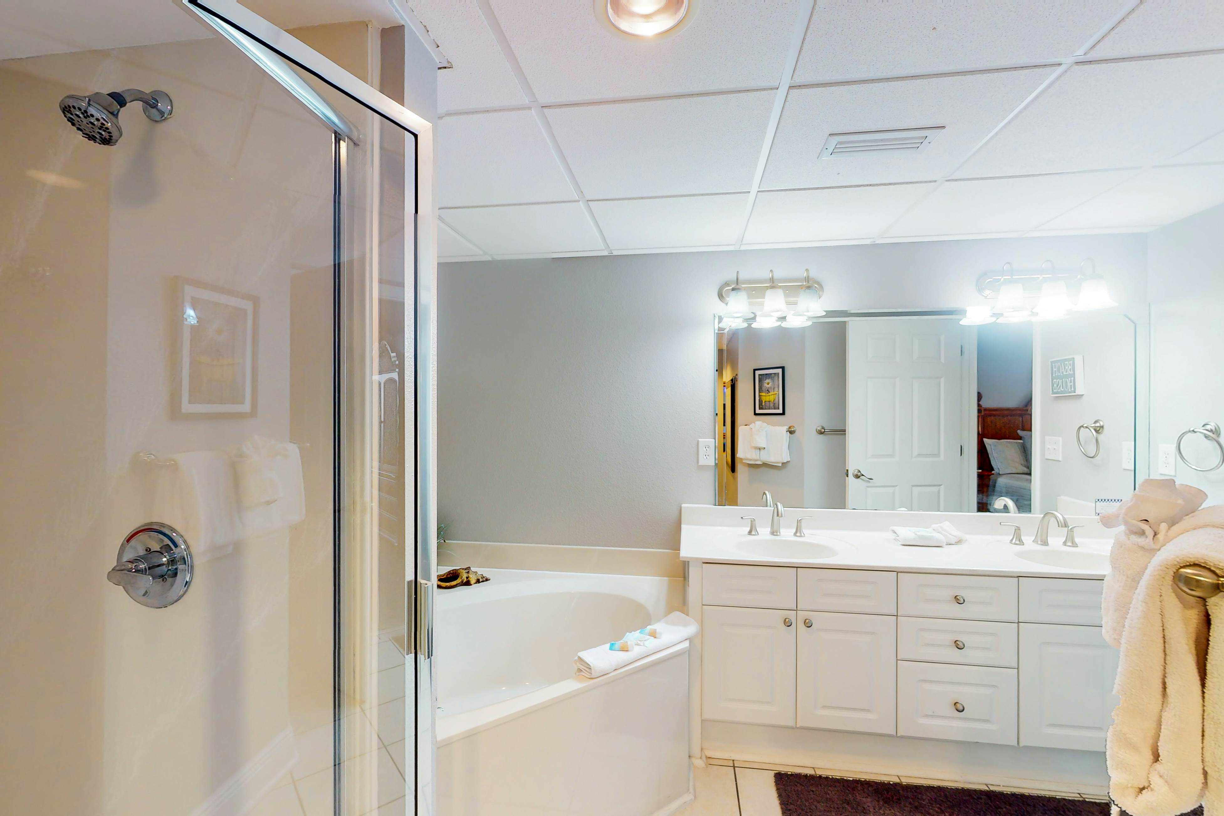 Resort condo on the beach with Gulf views, pools, hot tub, gym & game room