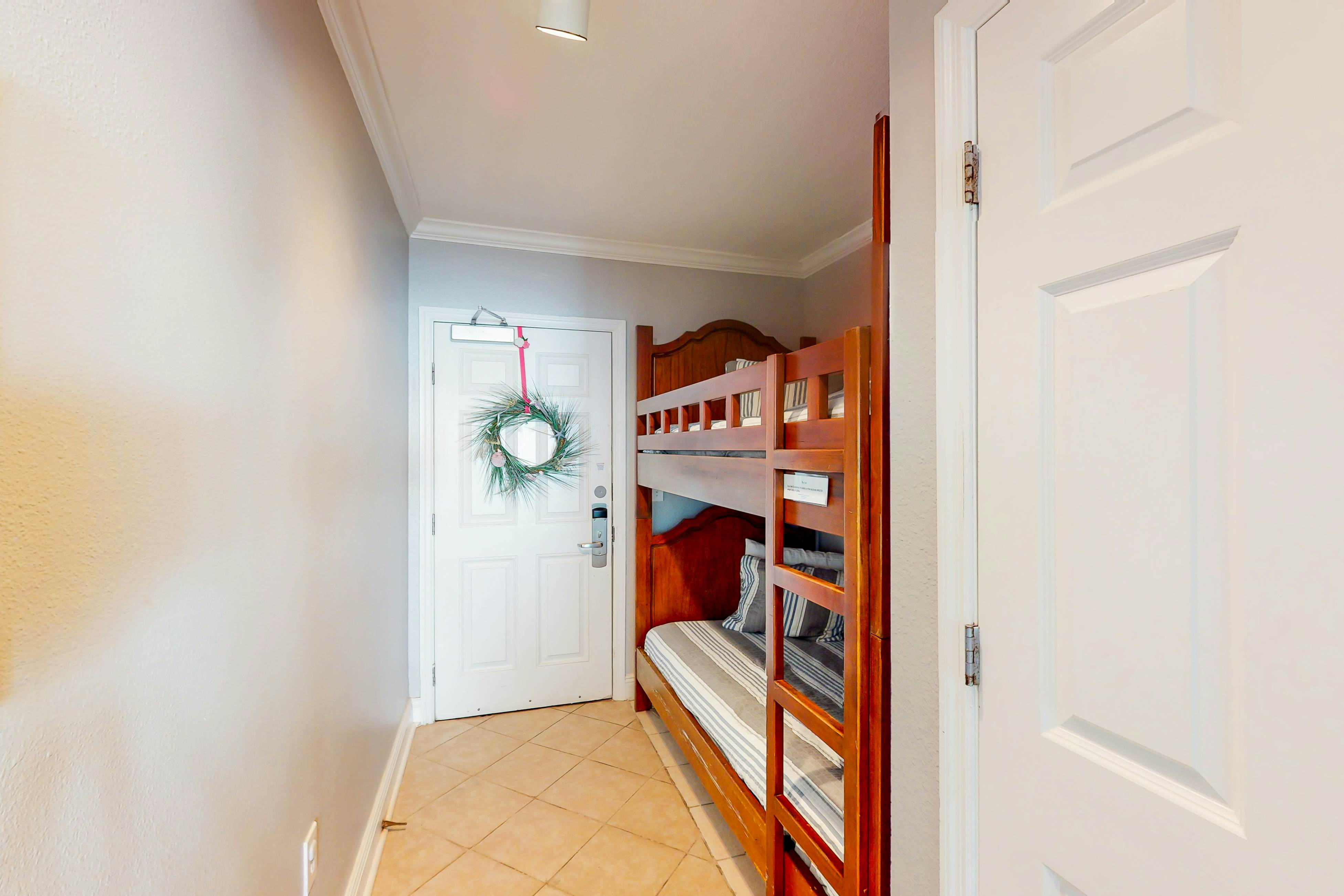 Resort condo on the beach with Gulf views, pools, hot tub, gym & game room