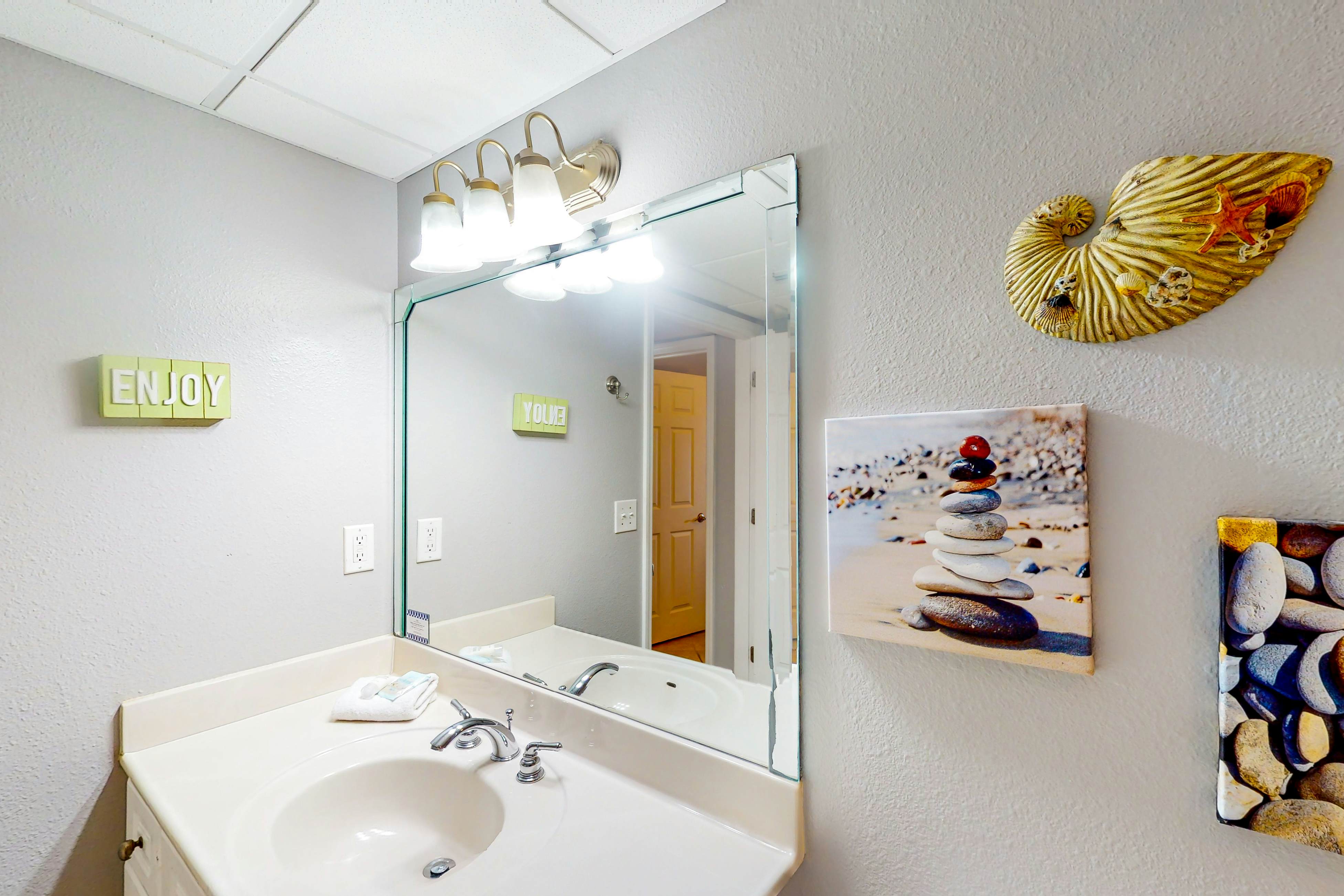 Resort condo on the beach with Gulf views, pools, hot tub, gym & game room