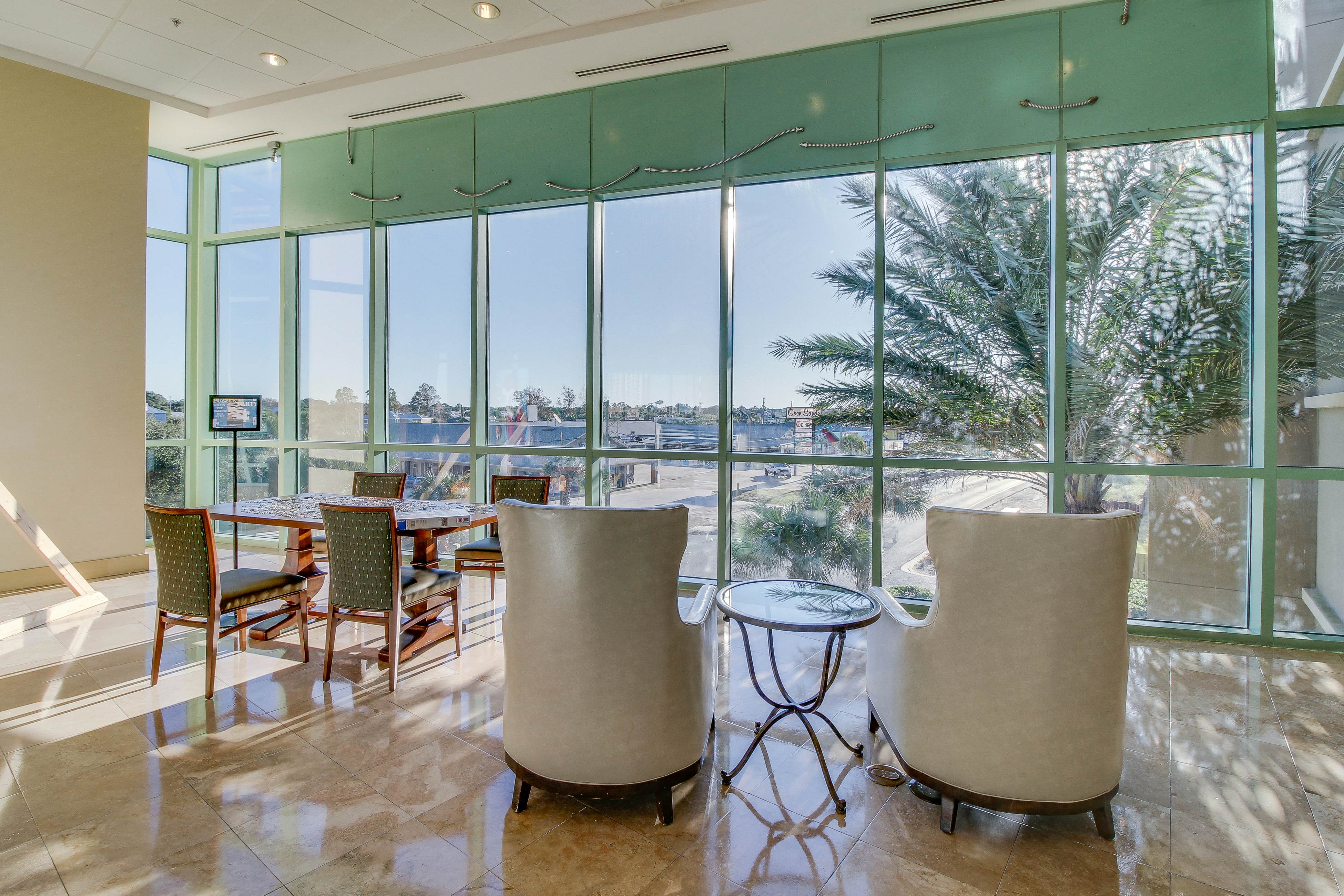 Resort condo on the beach with Gulf views, pools, hot tub, gym & game room