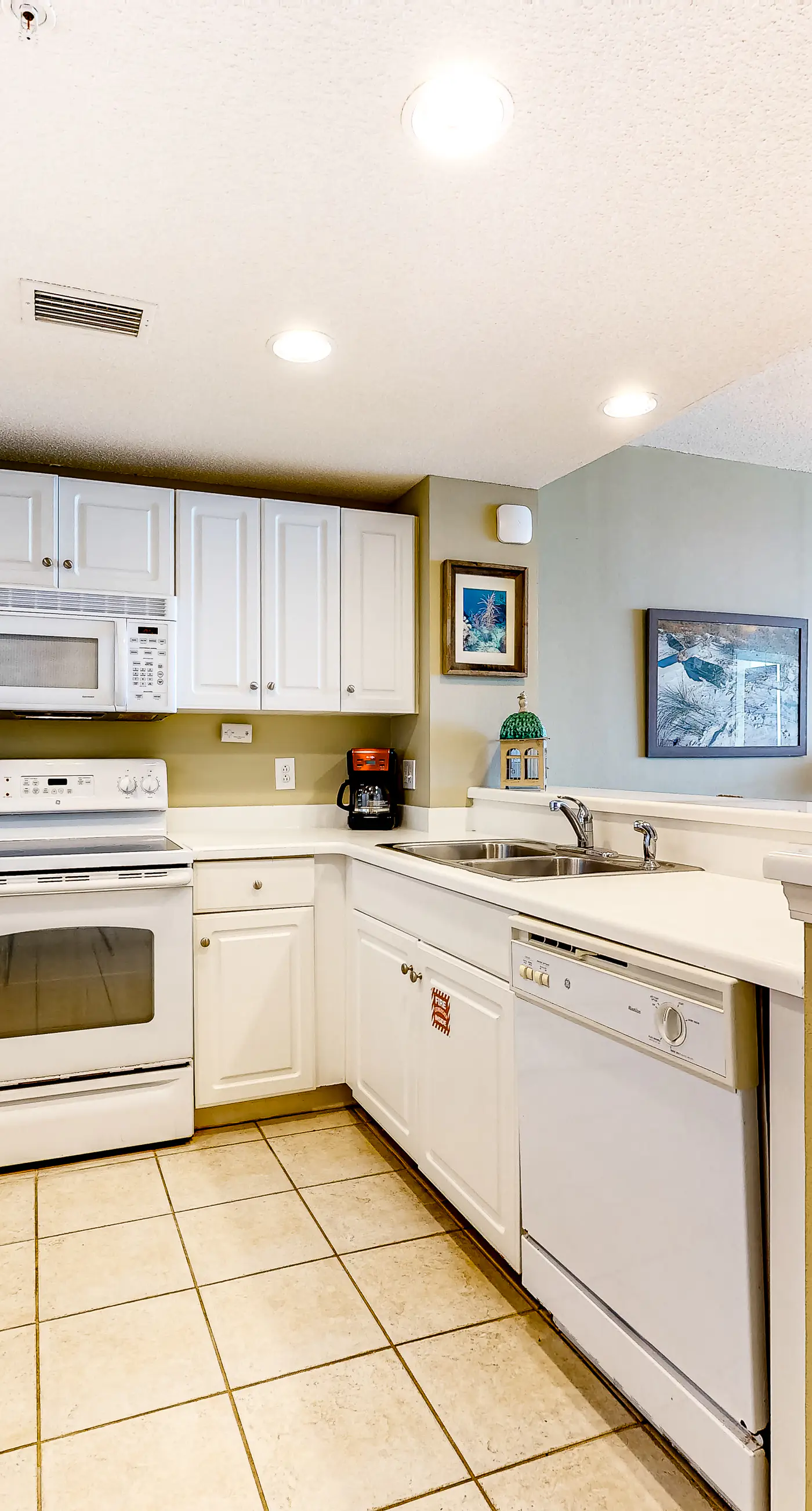 Sun-soaked oceanfront escape with pool, hot tub, central AC, & tennis court