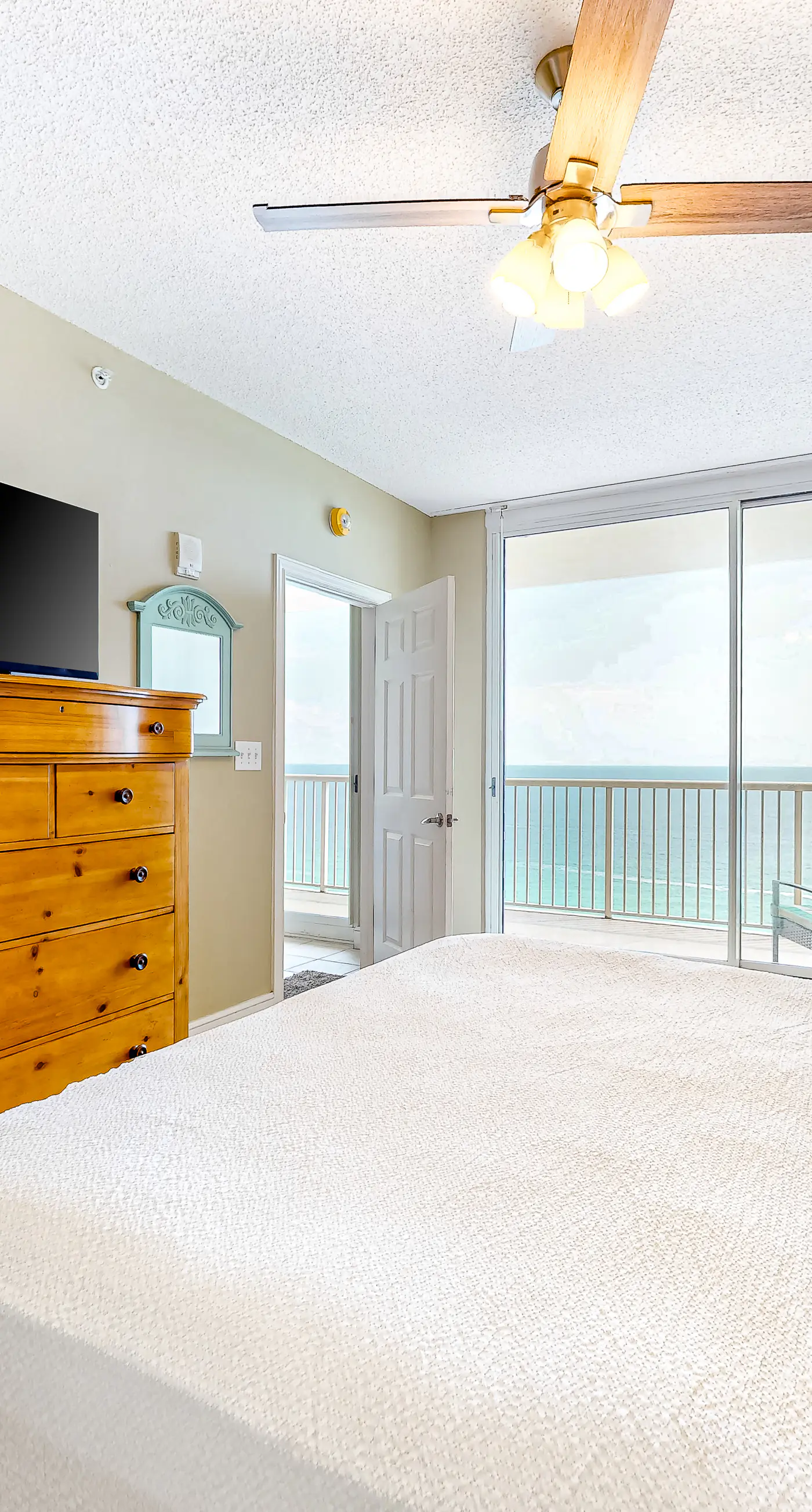 Sun-soaked oceanfront escape with pool, hot tub, central AC, & tennis court