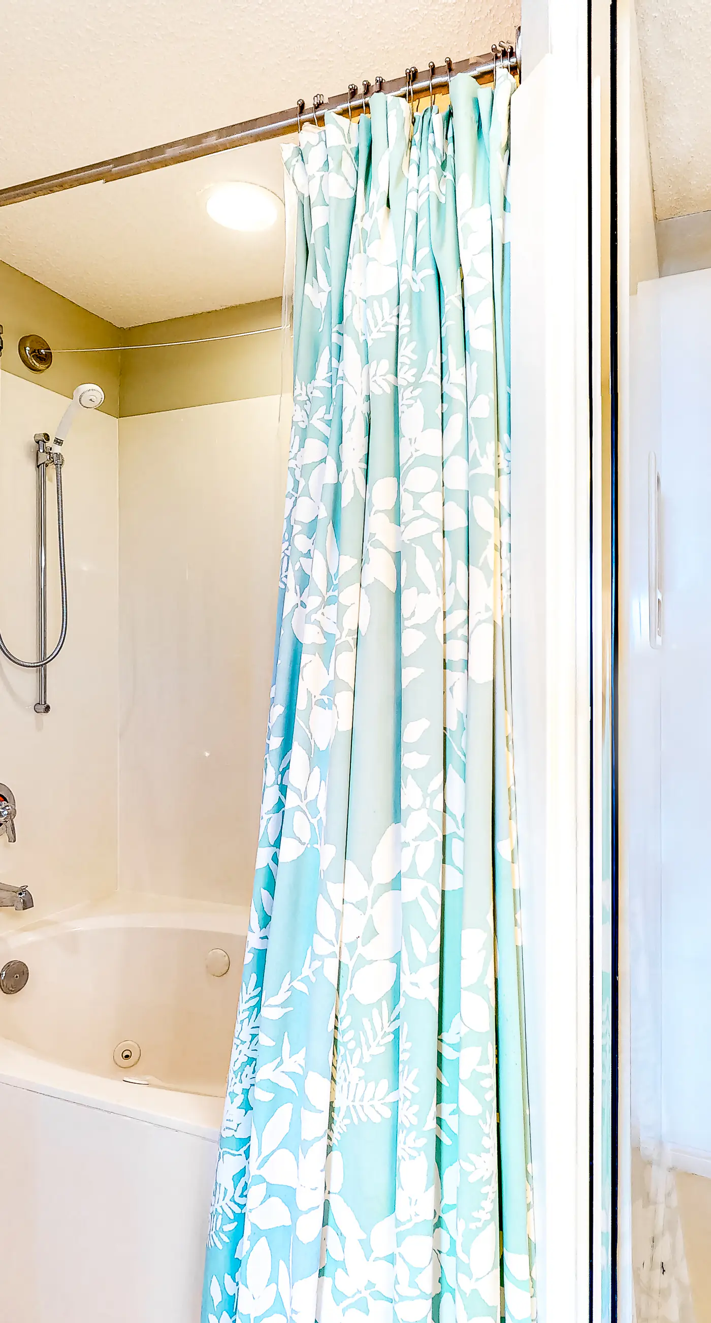 Sun-soaked oceanfront escape with pool, hot tub, central AC, & tennis court