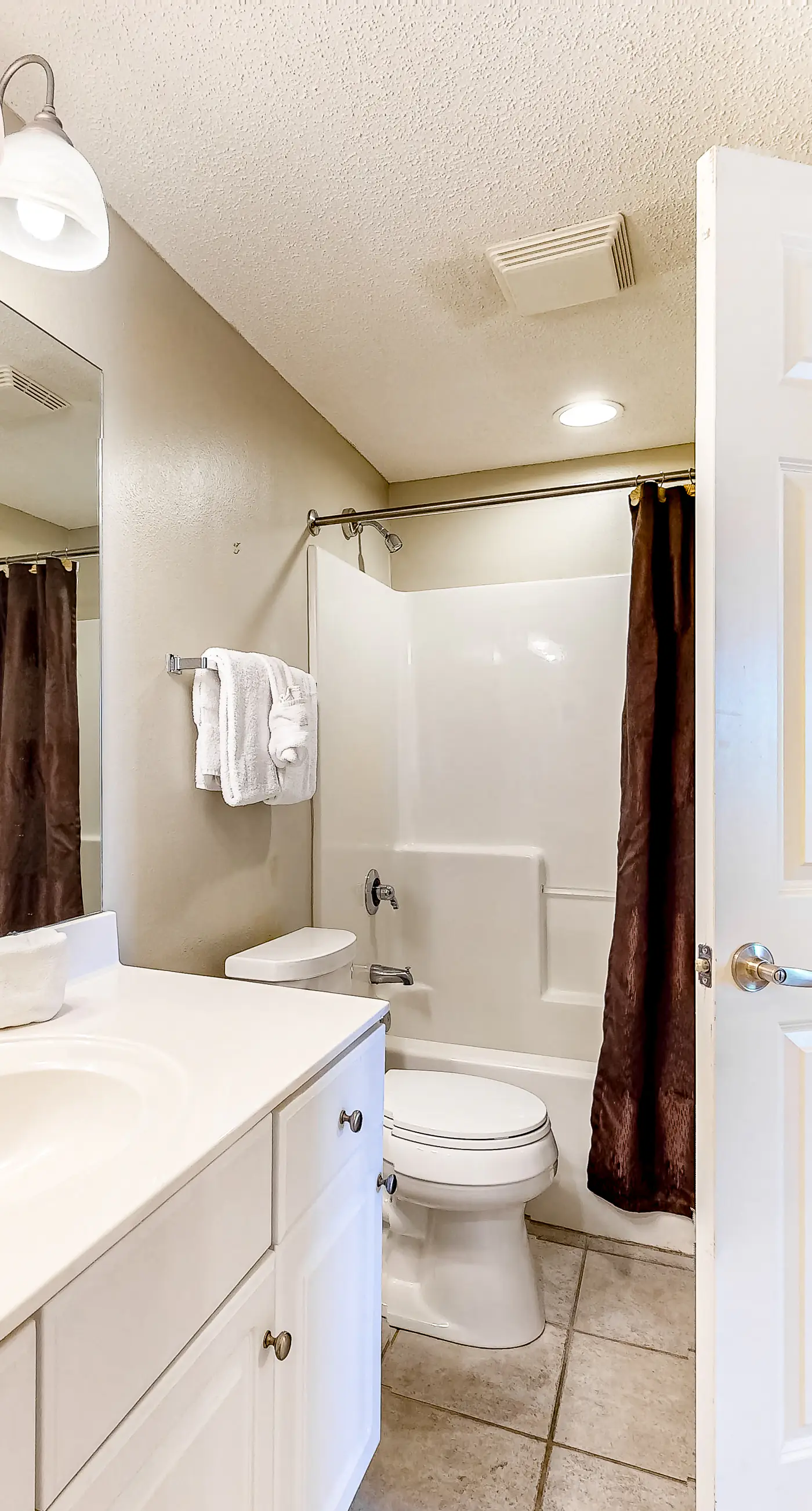 Sun-soaked oceanfront escape with pool, hot tub, central AC, & tennis court