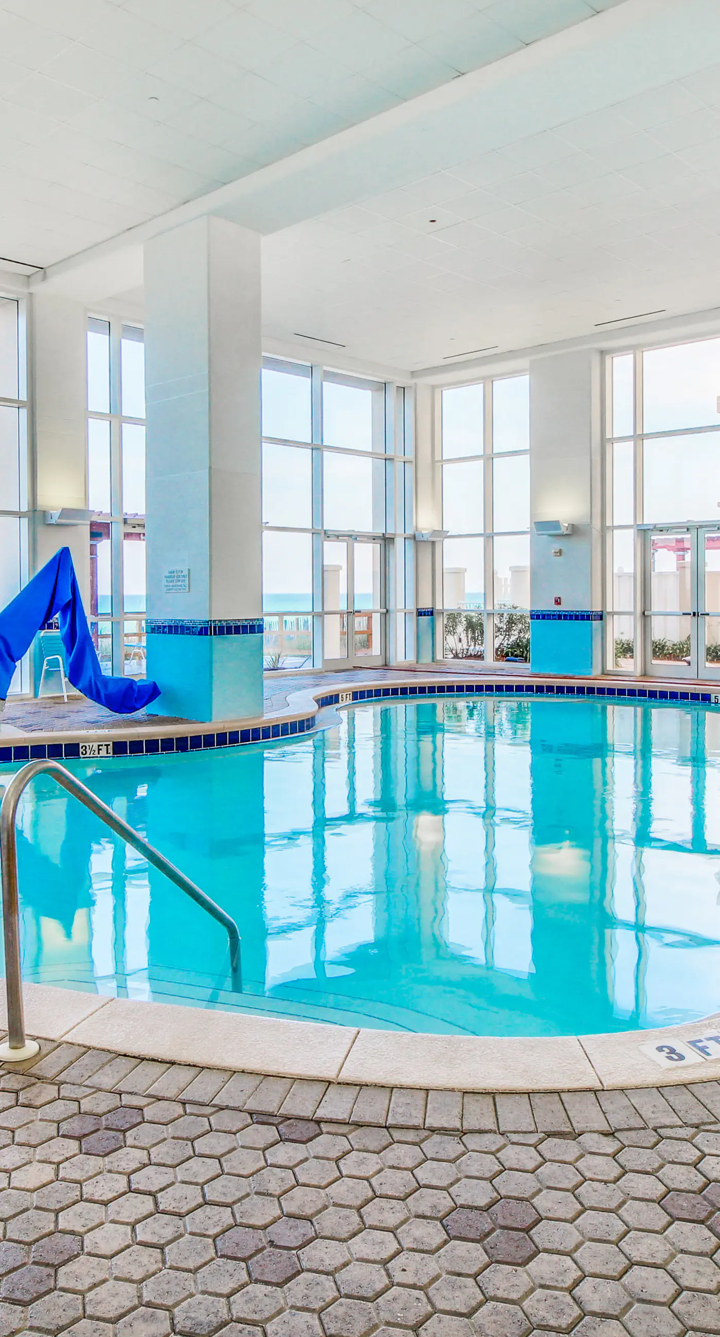 Sun-soaked oceanfront escape with pool, hot tub, central AC, & tennis court