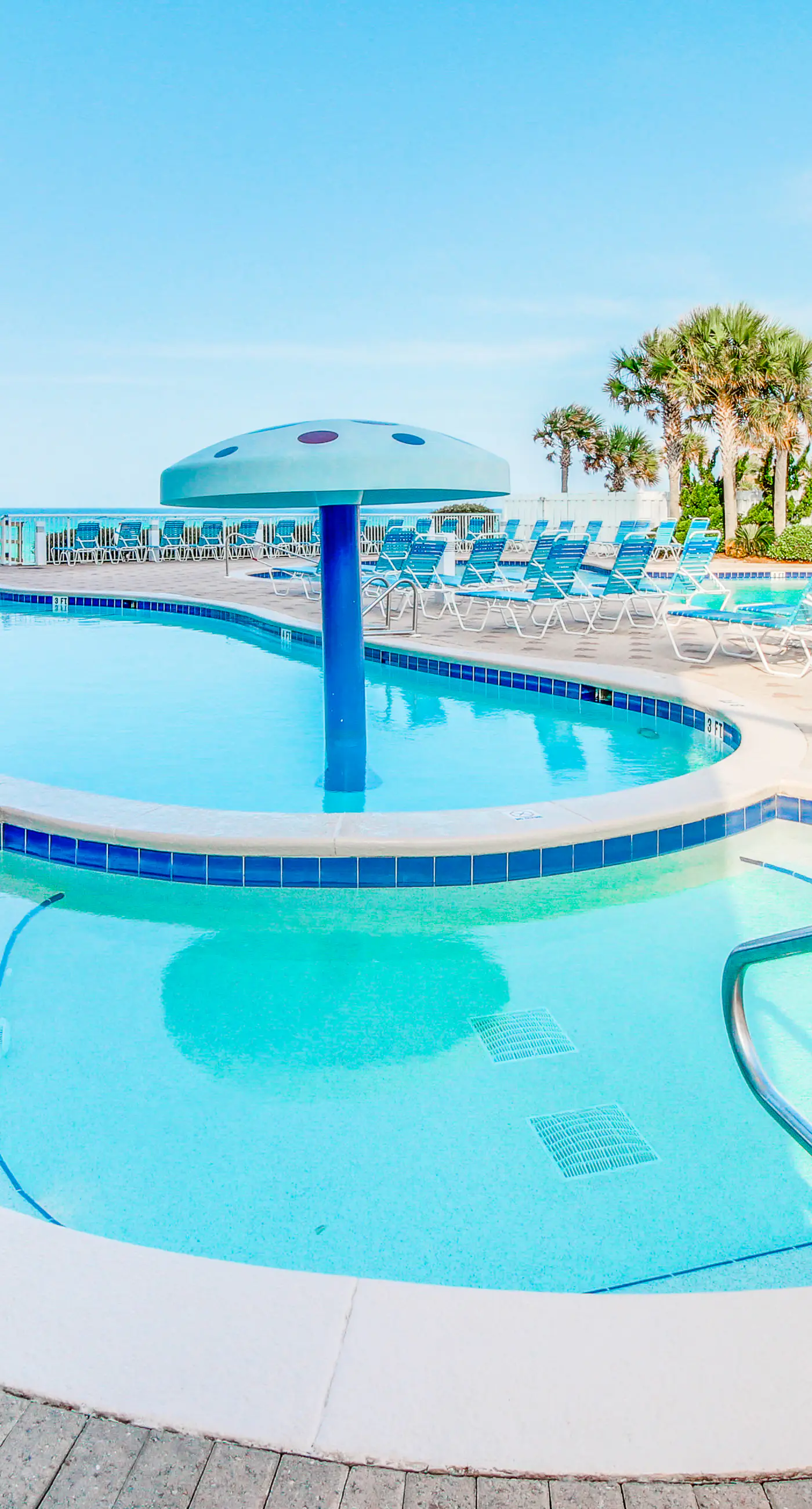 Sun-soaked oceanfront escape with pool, hot tub, central AC, & tennis court