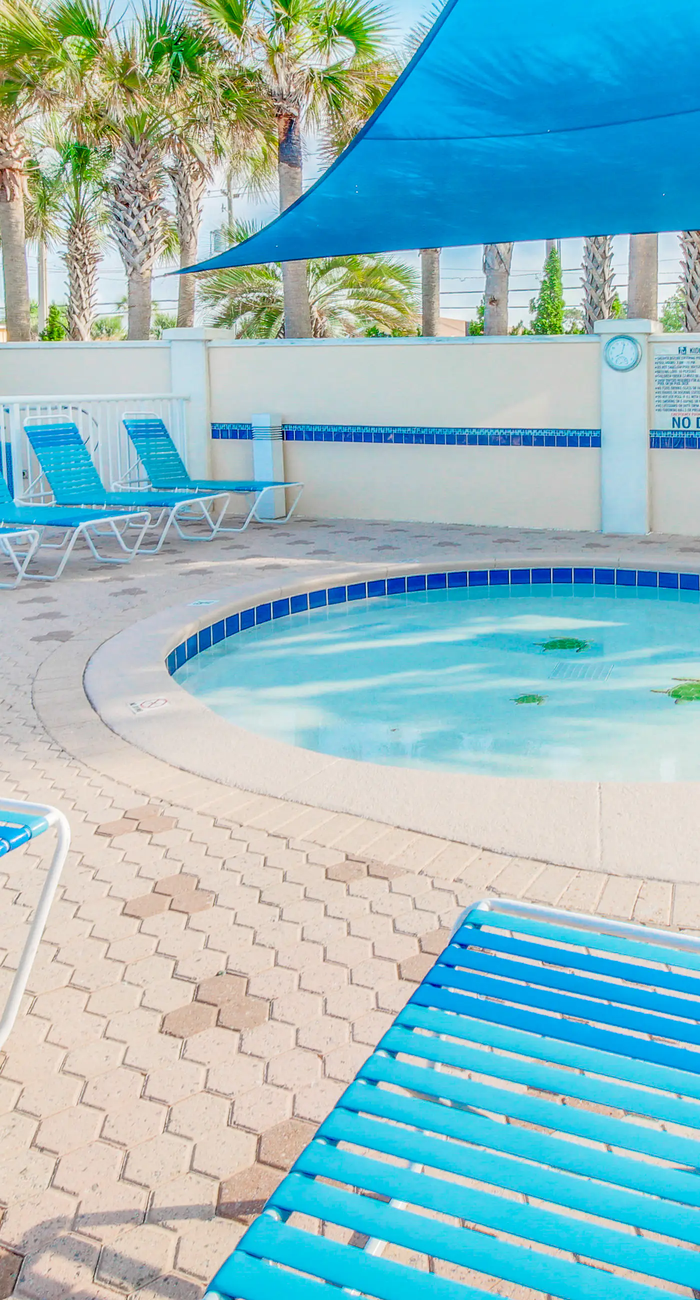 Sun-soaked oceanfront escape with pool, hot tub, central AC, & tennis court