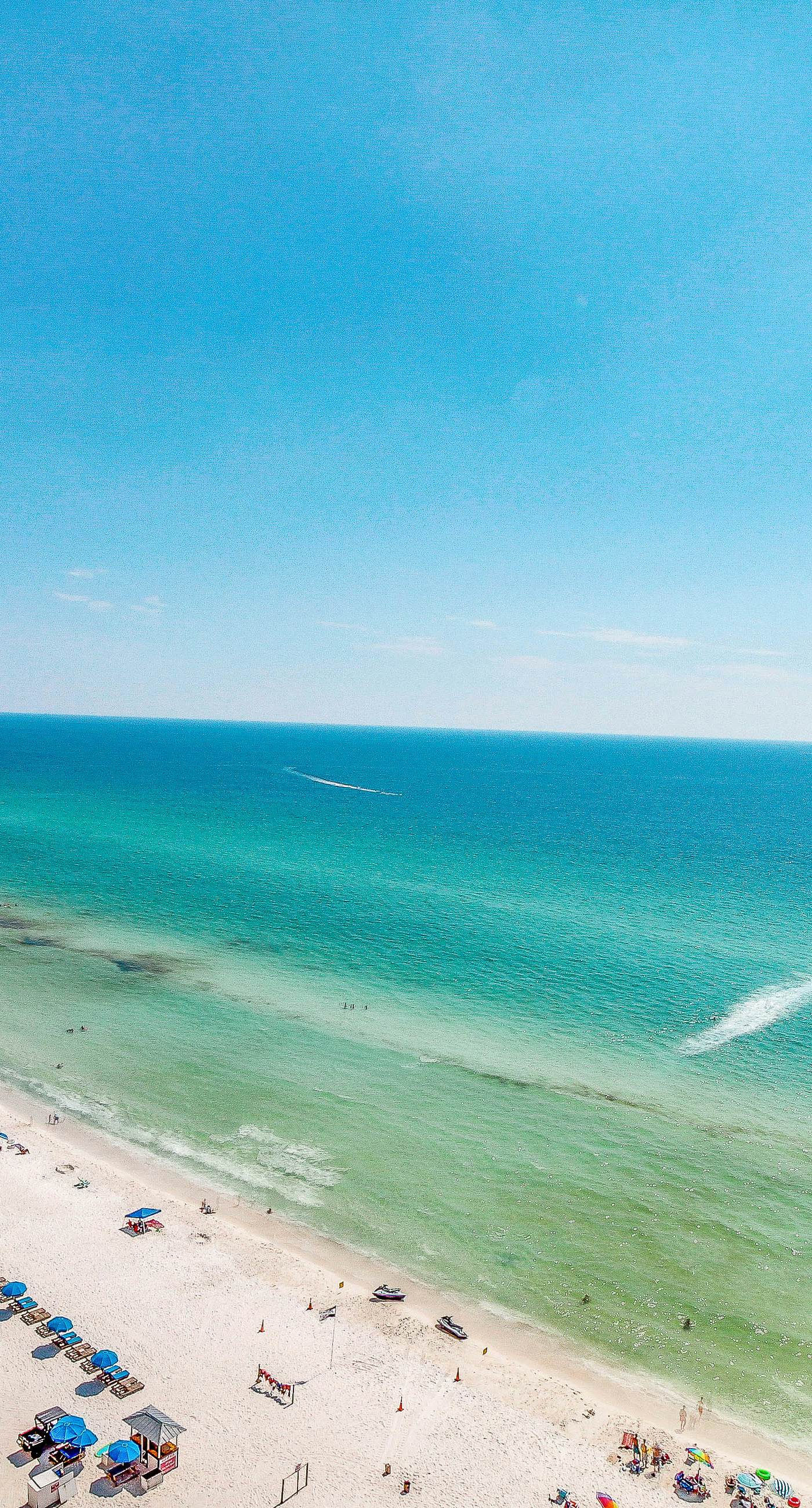 Sun-soaked oceanfront escape with pool, hot tub, central AC, & tennis court