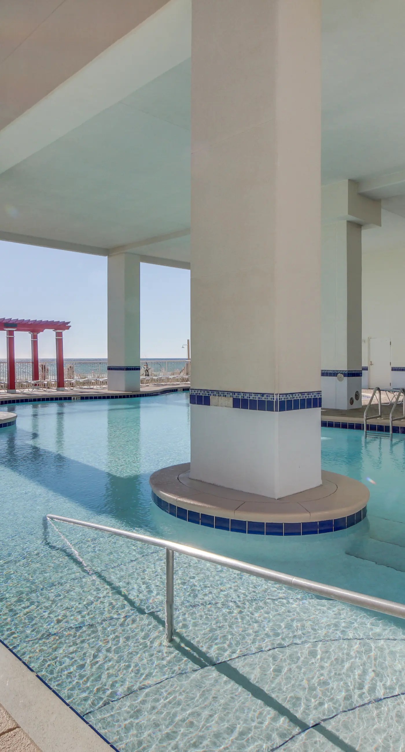 Beachfront condo rental with pools, hot tub, and private balcony