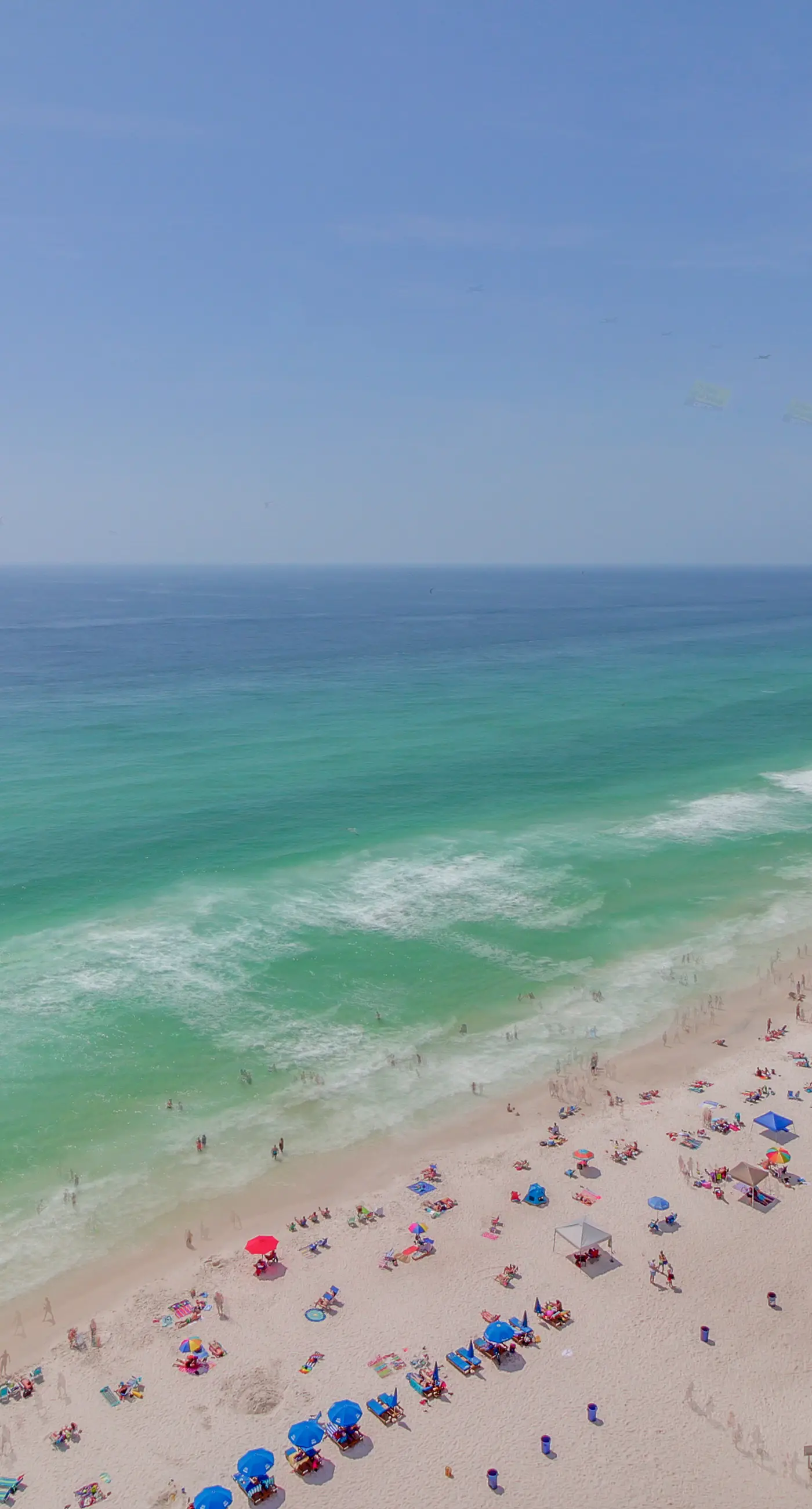 Beachfront condo rental with pools, hot tub, and private balcony